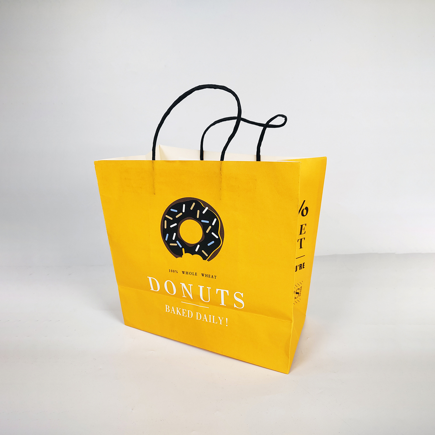 Wholesale Kraft Yellow Shopping Paper Bag with Twisted Handle