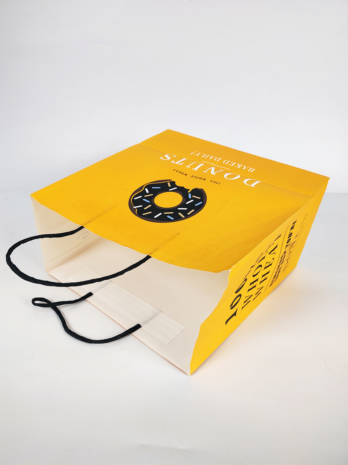 Wholesale Kraft Yellow Shopping Paper Bag with Twisted Handle