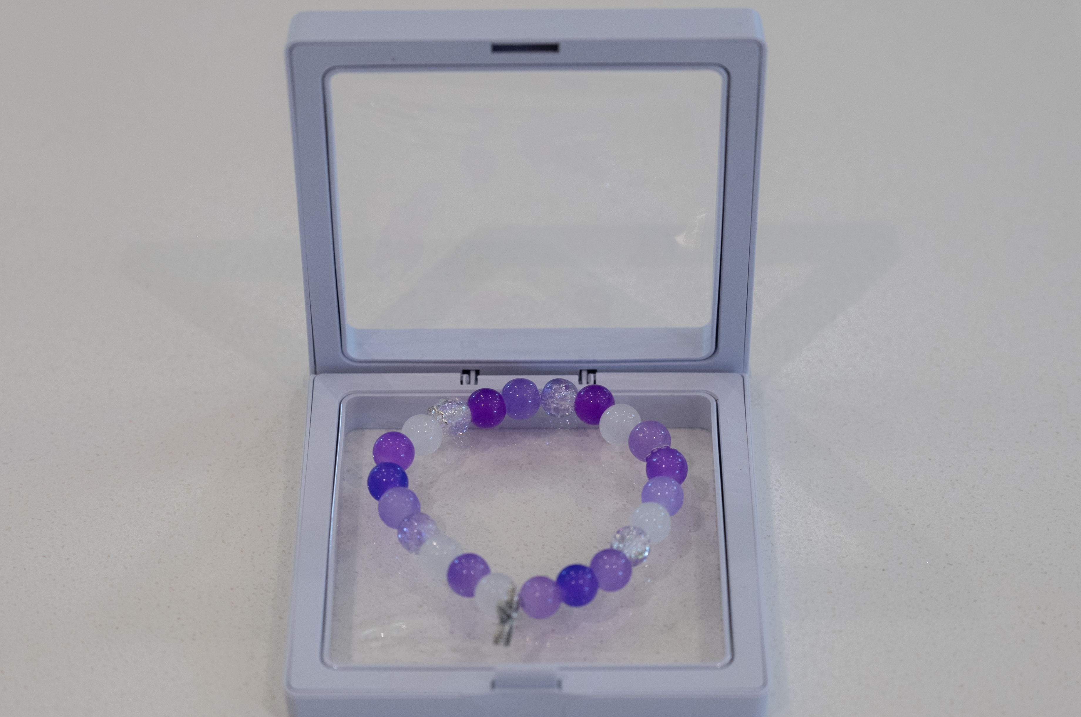 Purple and White Beaded Bracelet