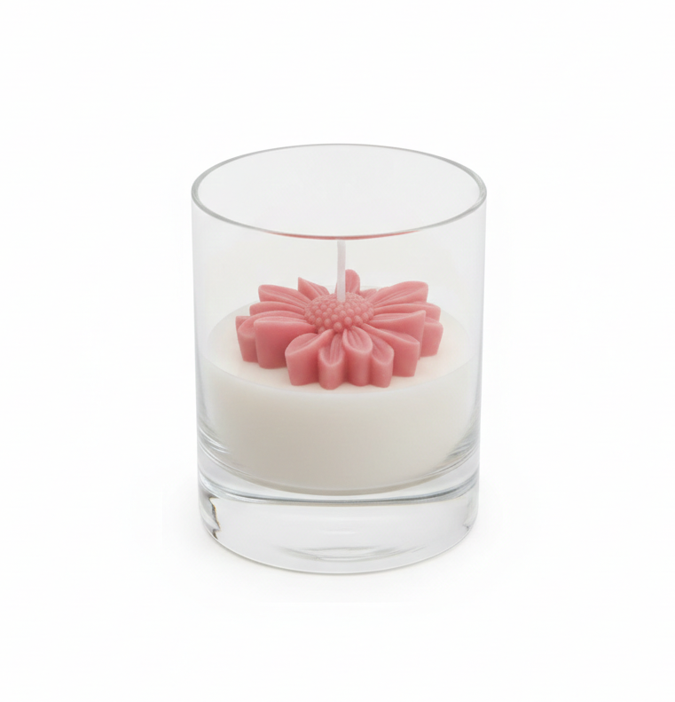 Žvakė gėlė stikliniame inde