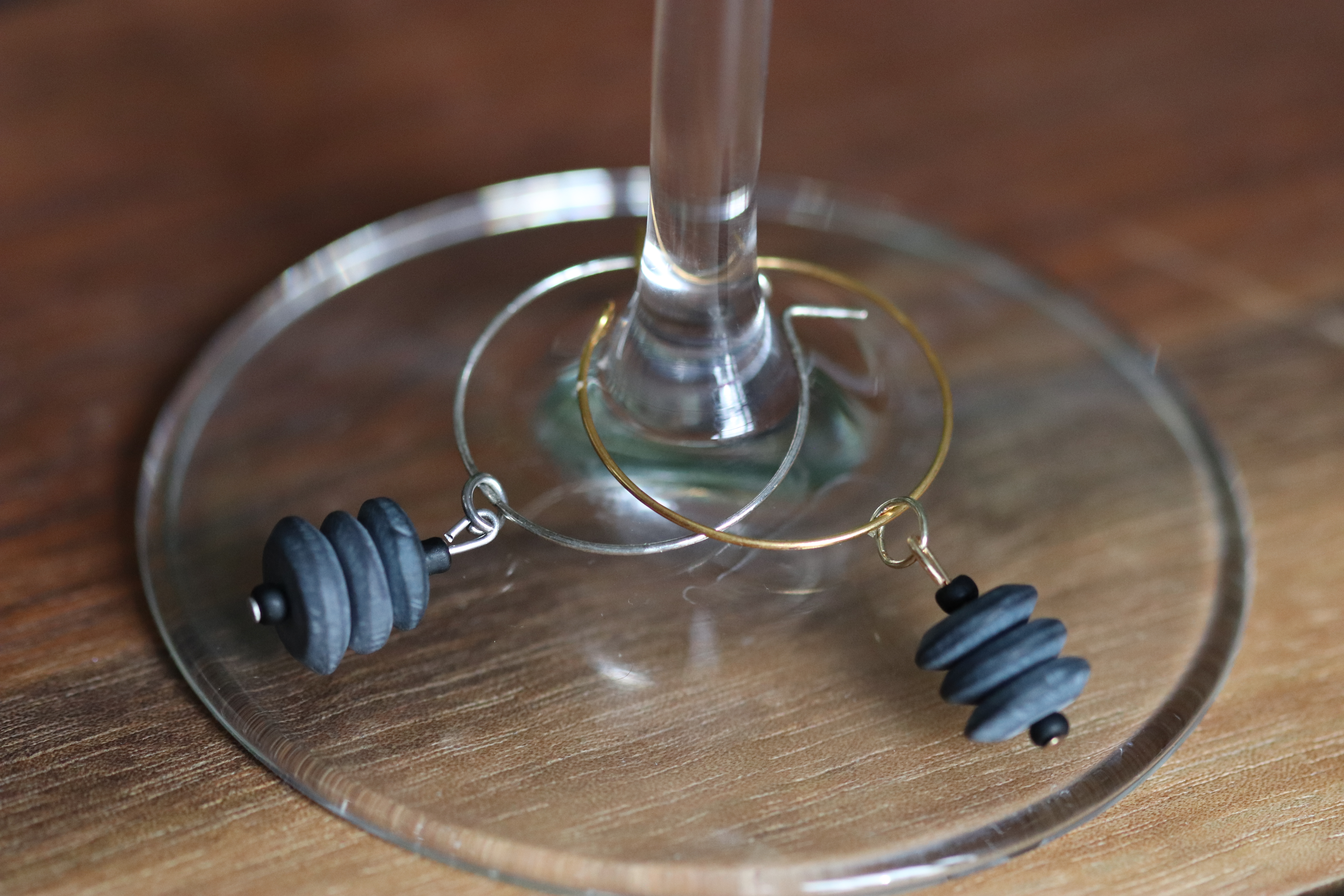 Black Stacked Ceramic Wine Charm called "Stacked Rocks"