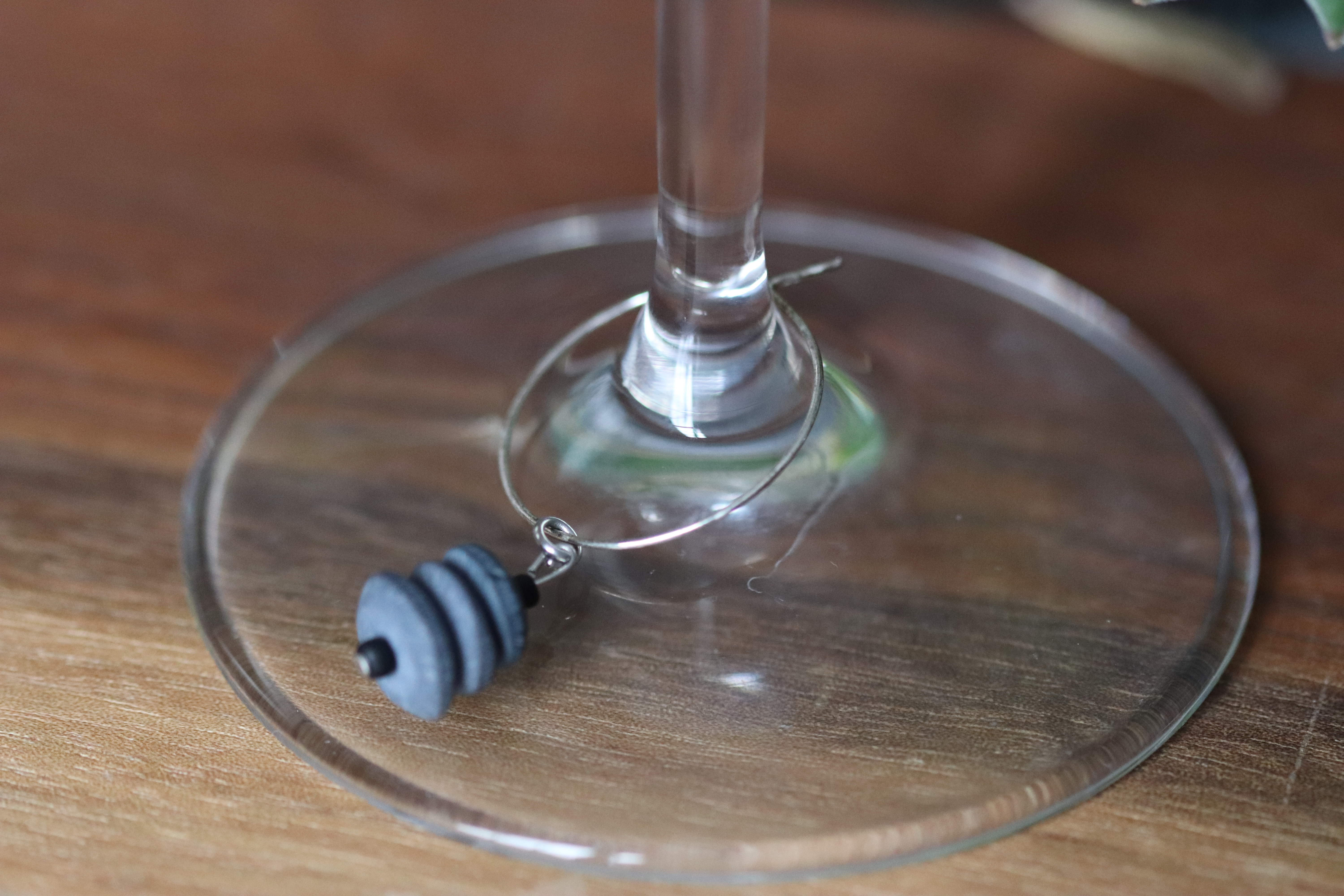 Black Stacked Ceramic Wine Charm called "Stacked Rocks"