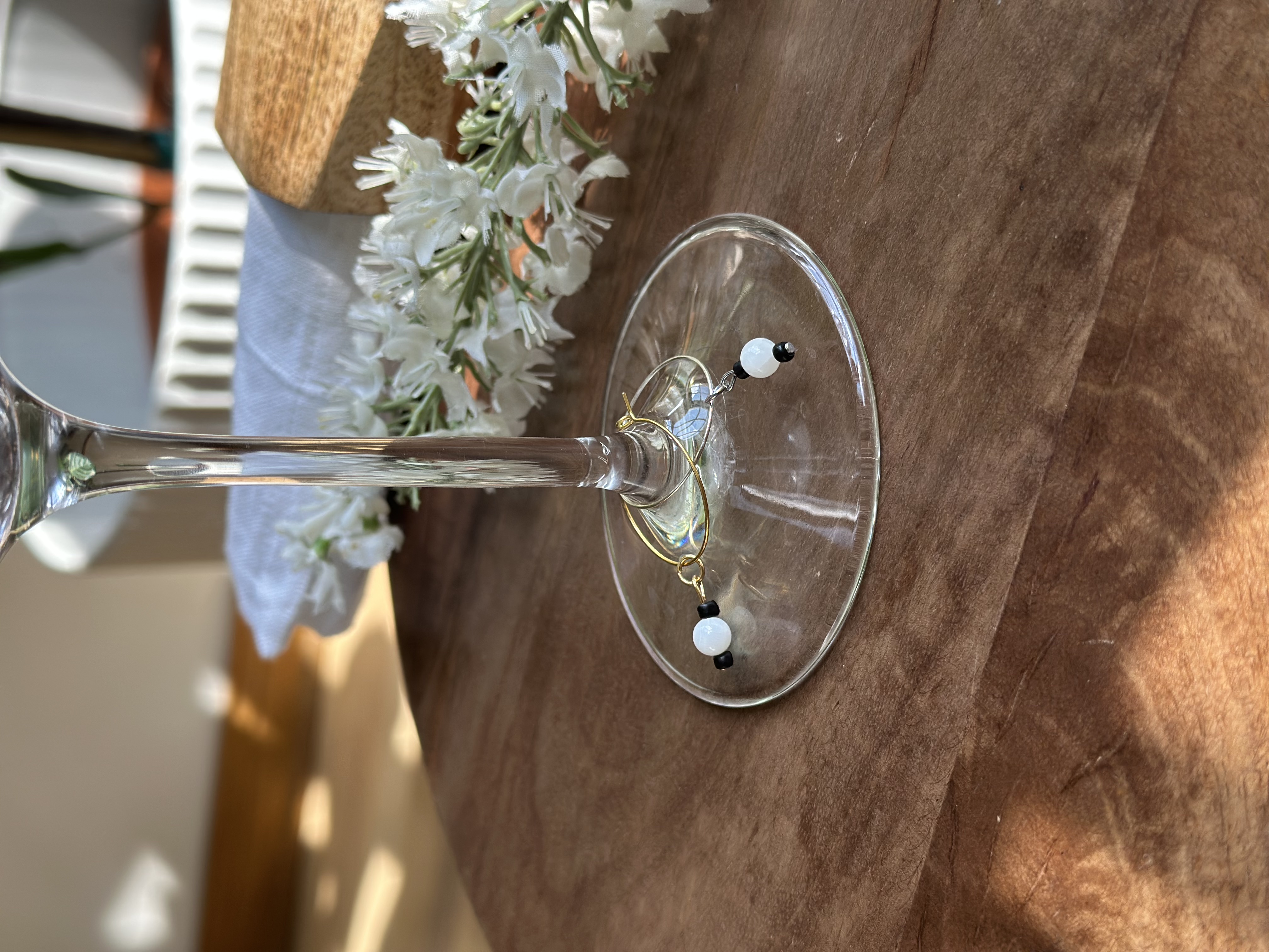 Bright Gemstone White Shell Wine Charm called "Hail"