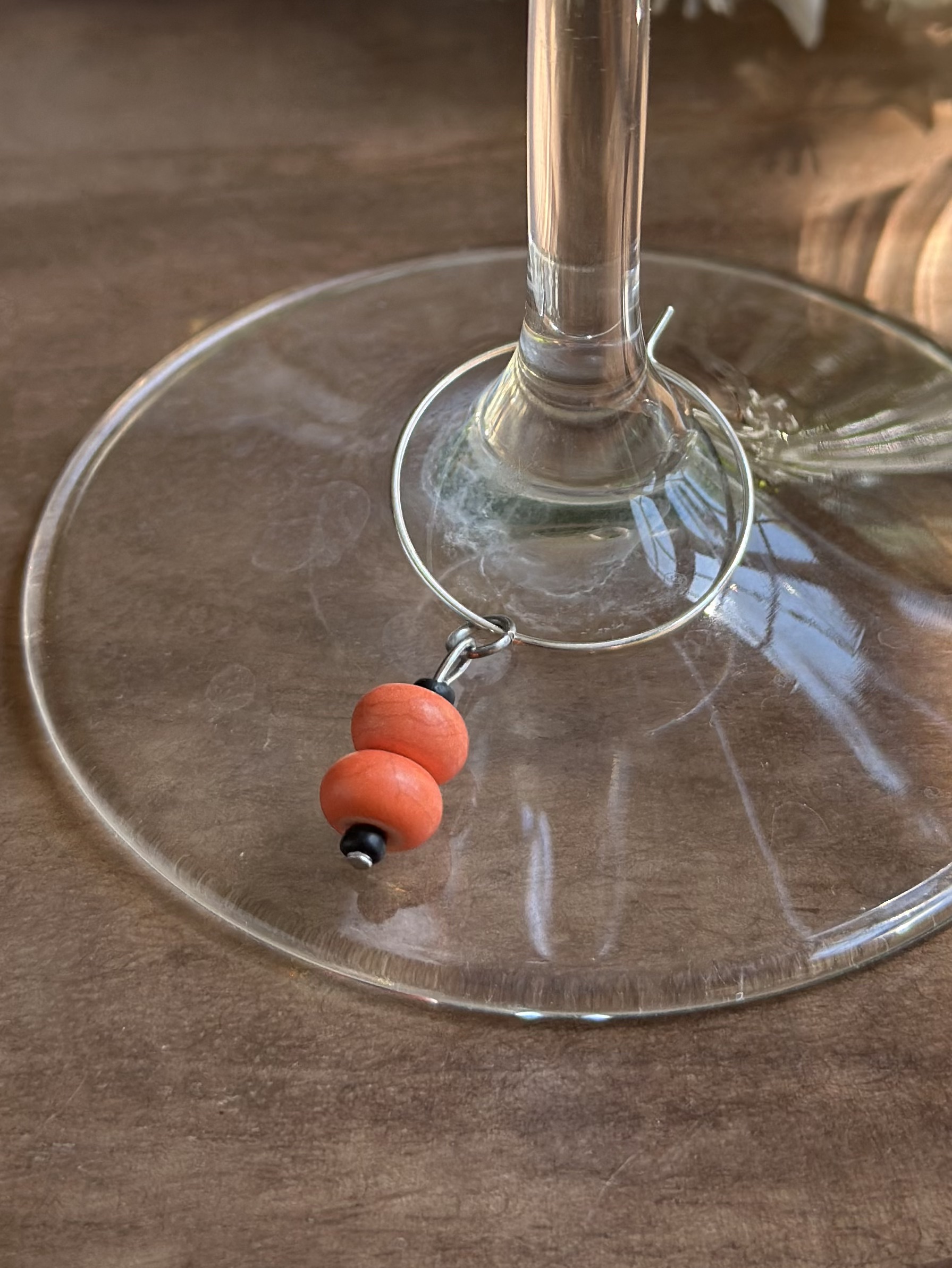 Bright Orange Wagnerite Wine Charms called "Cuties"