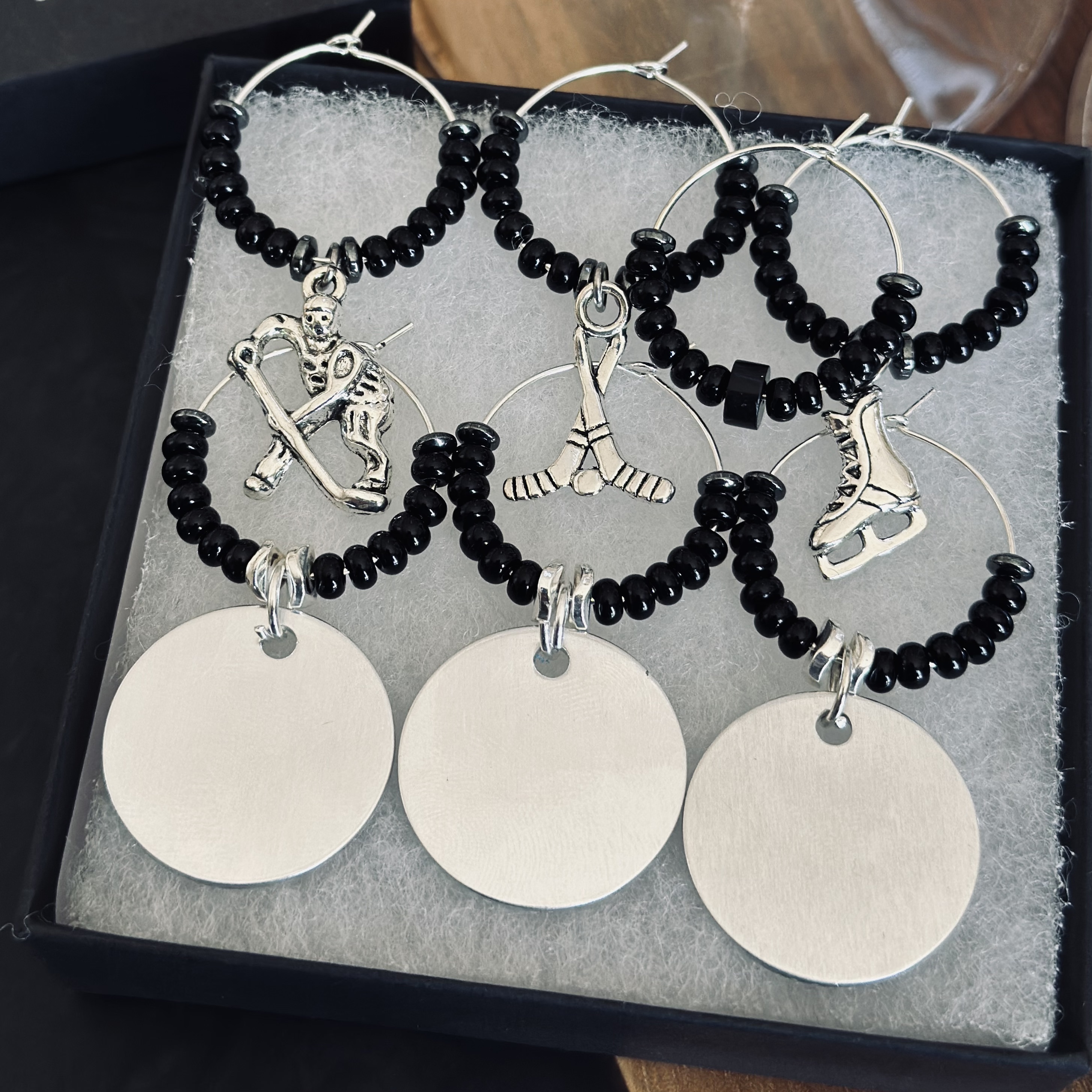 Set of 7 Hockey wine charms including 3 personalized pendants and our signature "puck" charm