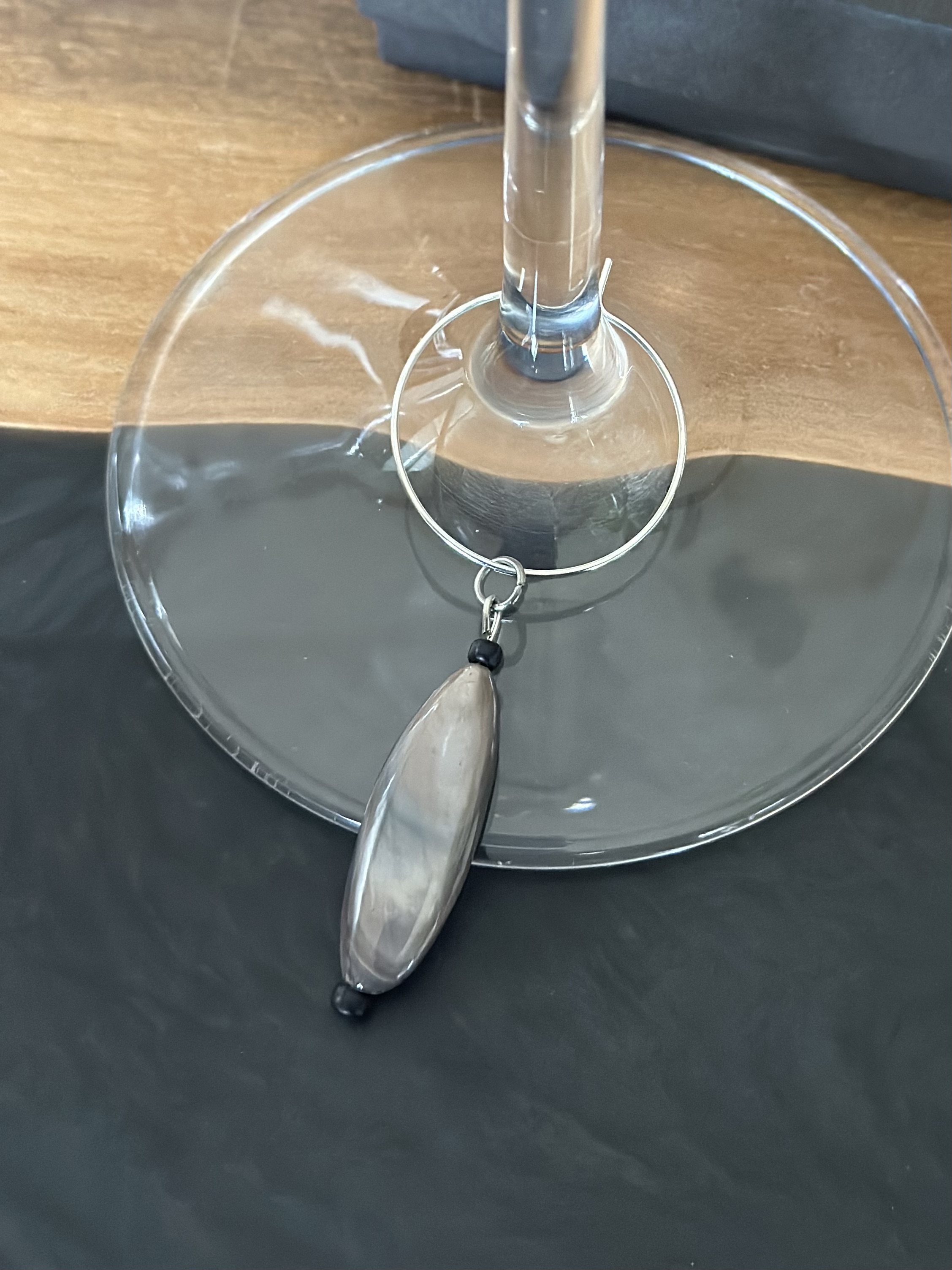 Shimmery Brown and Grey Wine Charm called "Kayak"