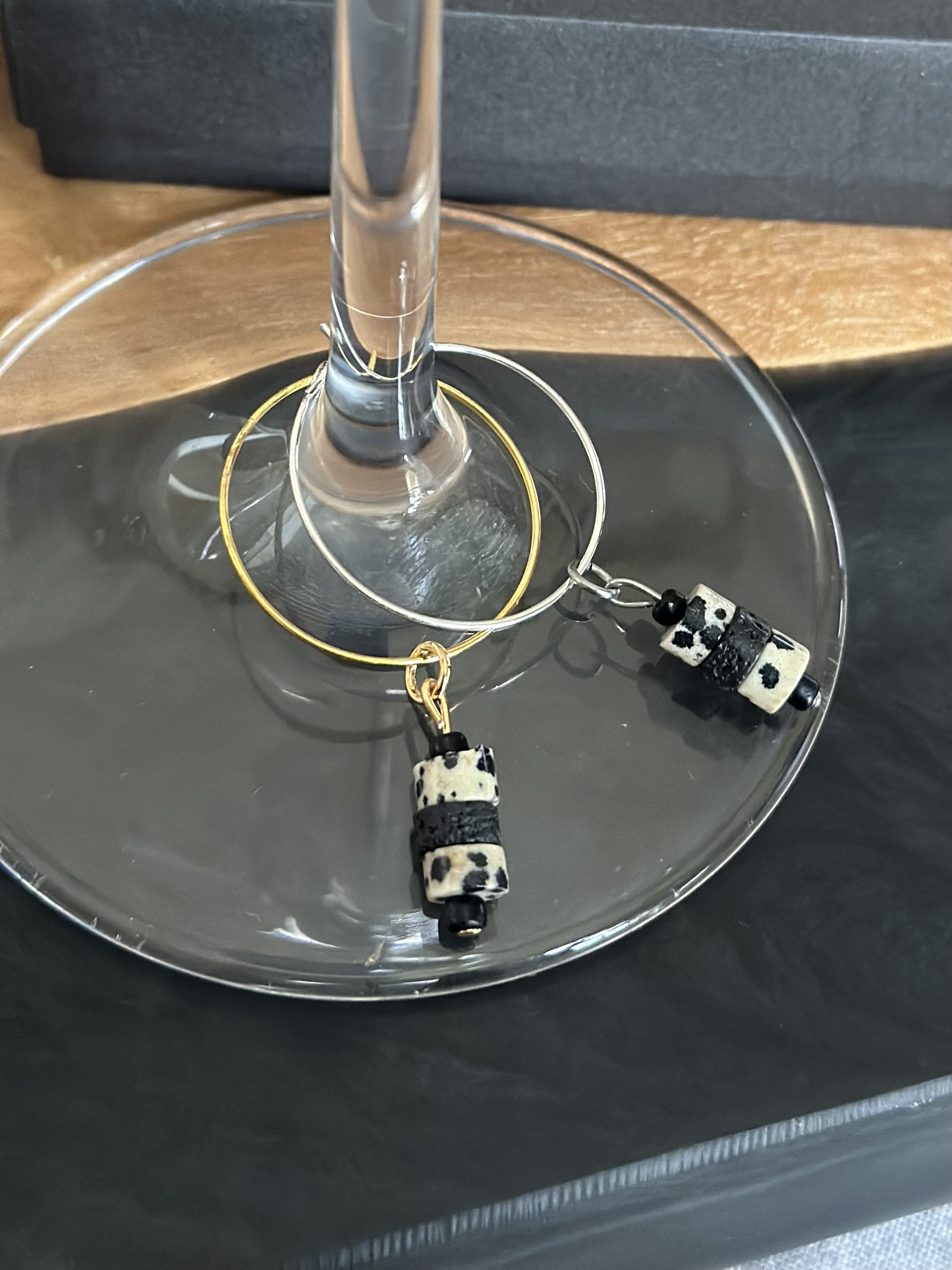 Unique Dalmatian Jasper and Lava stone wine charm called "Cookies and Cream"