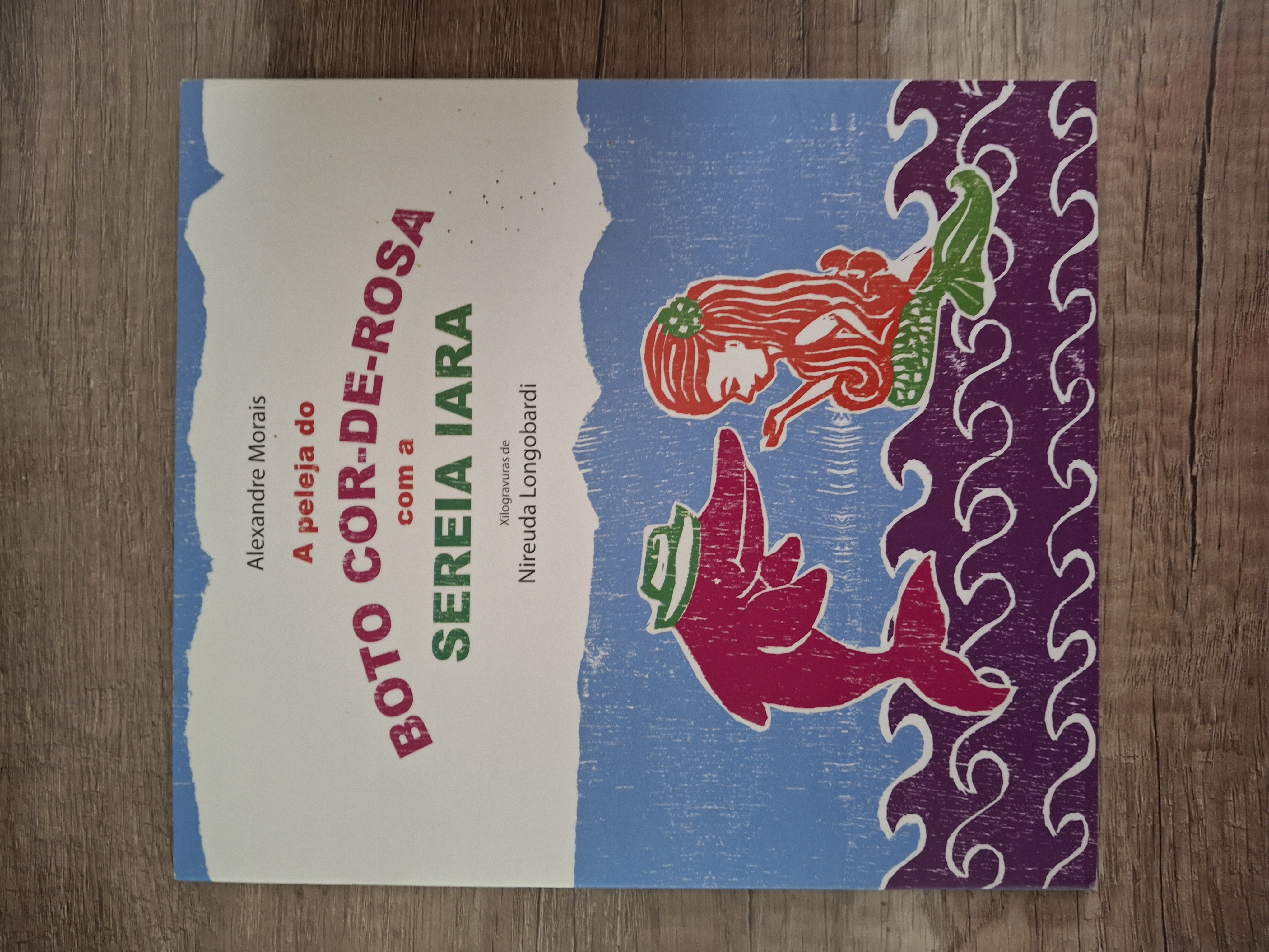 A pele do boto cor-de-rosa com a sereia Iara