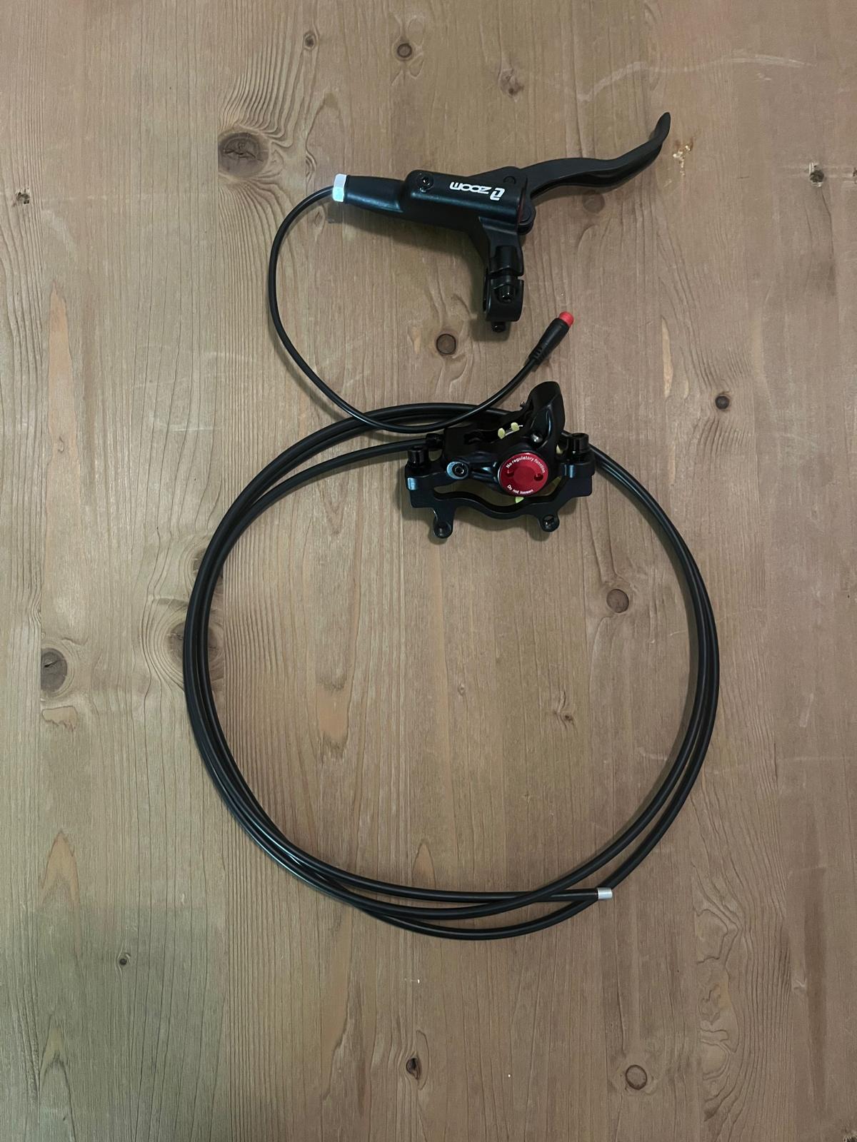 Fatbike hydraulische remset rechts achterzijde van zoom kleur zwart