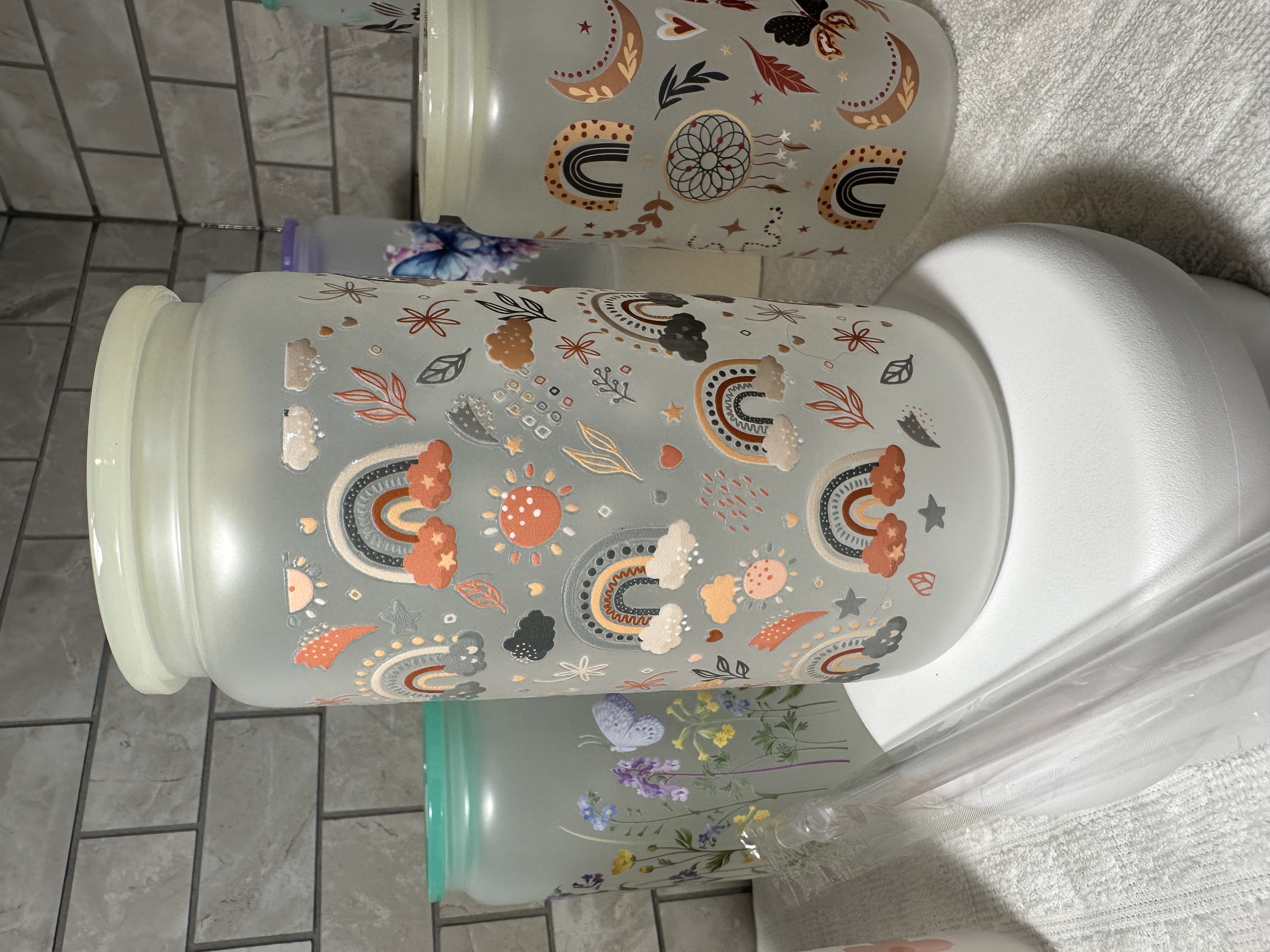 Vaso decorativo de vidrio sol y arcoíris