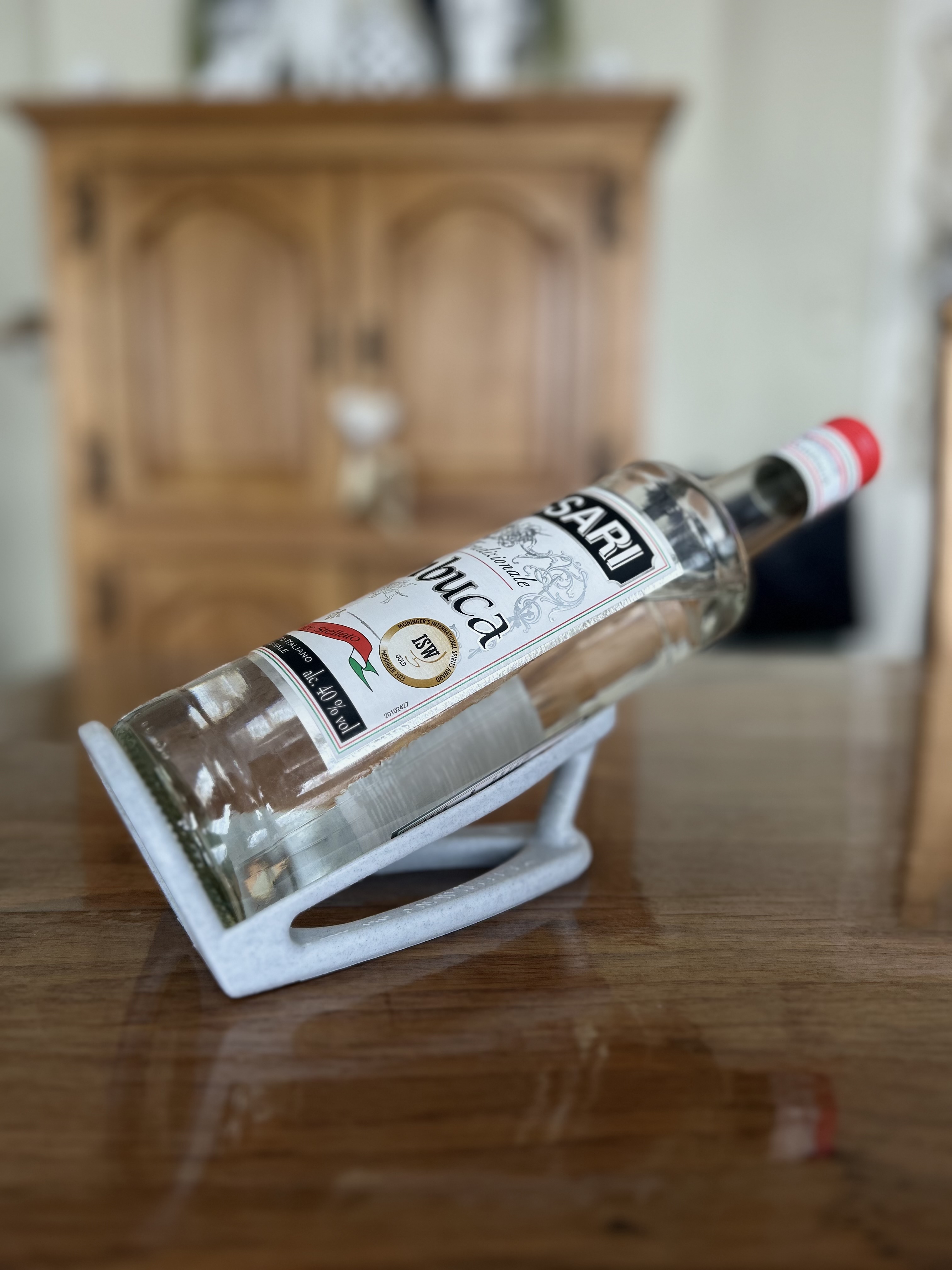 Support incliné pour bouteille 