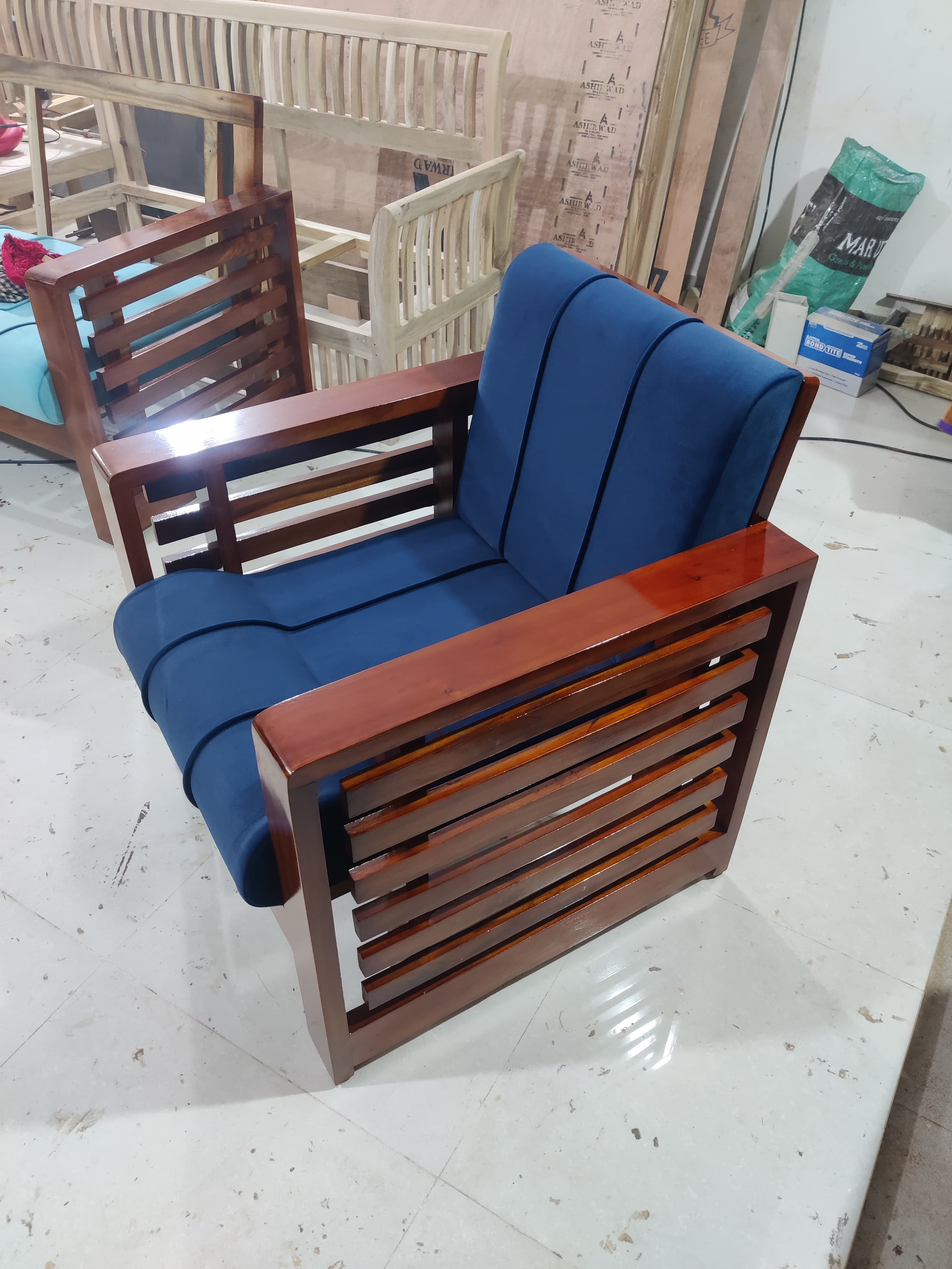 Modern Wooden Sofa with Blue Cushions