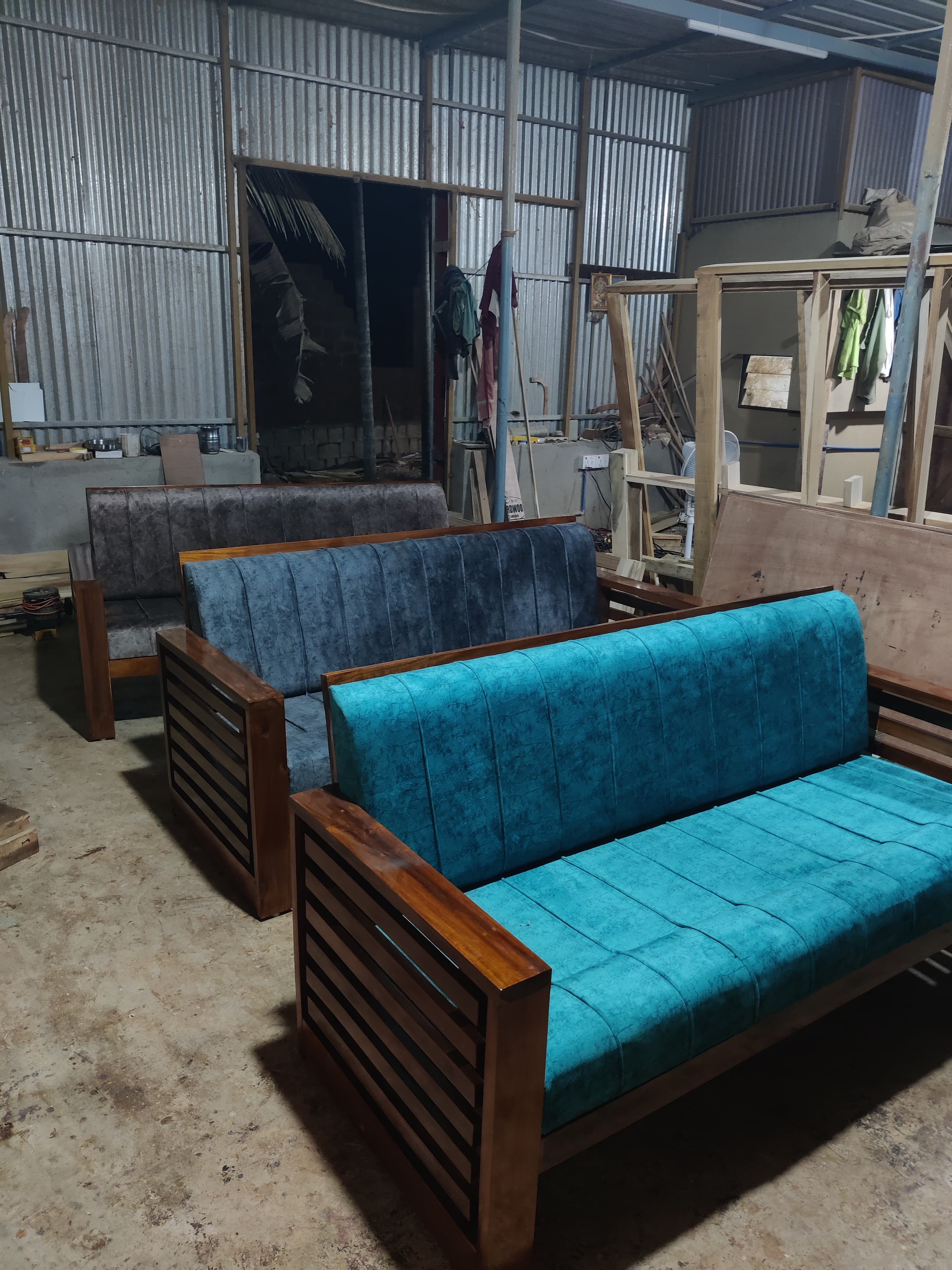 Modern Wooden Sofa with Blue Cushions