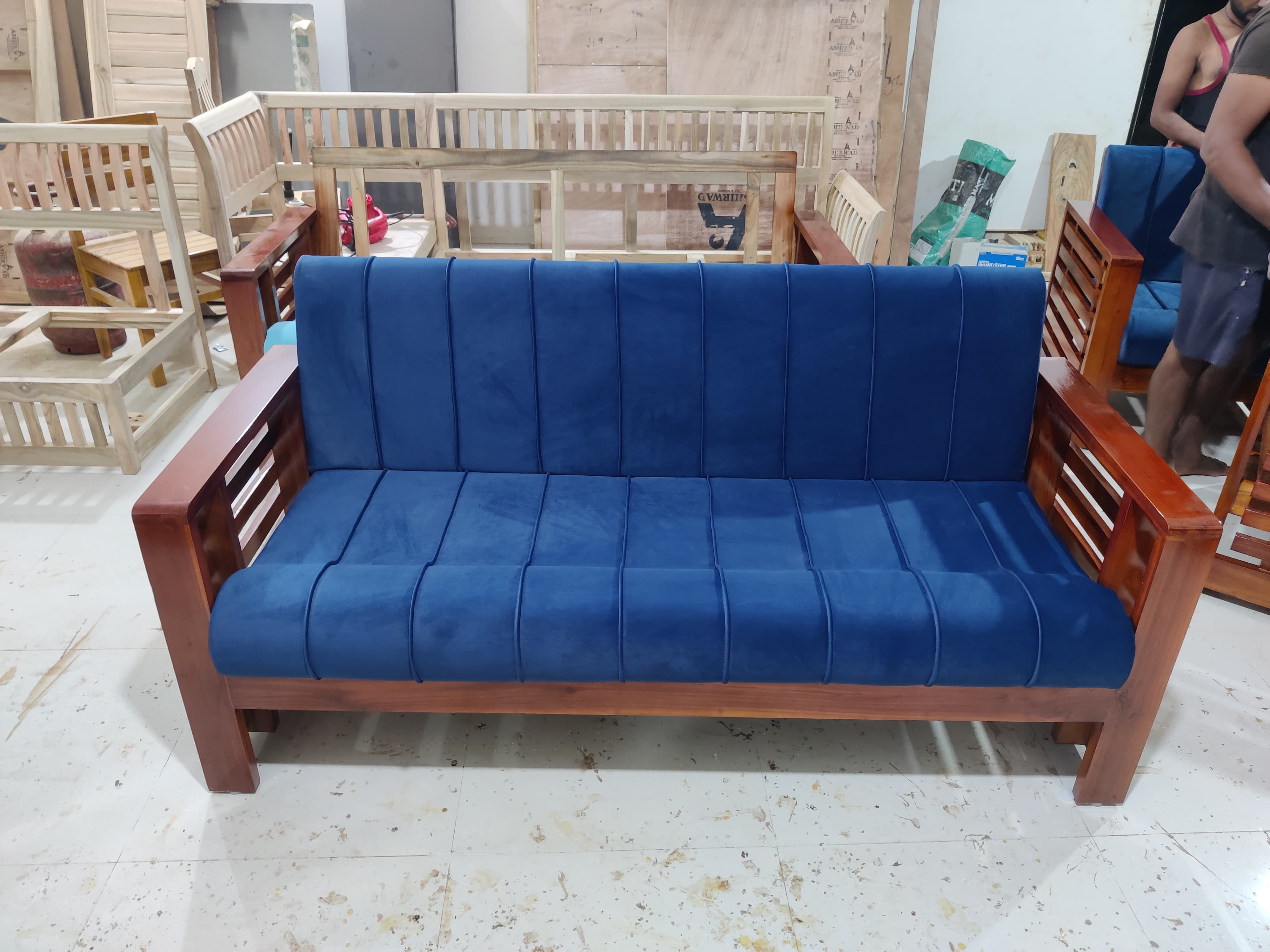 Modern Wooden Sofa with Blue Cushions