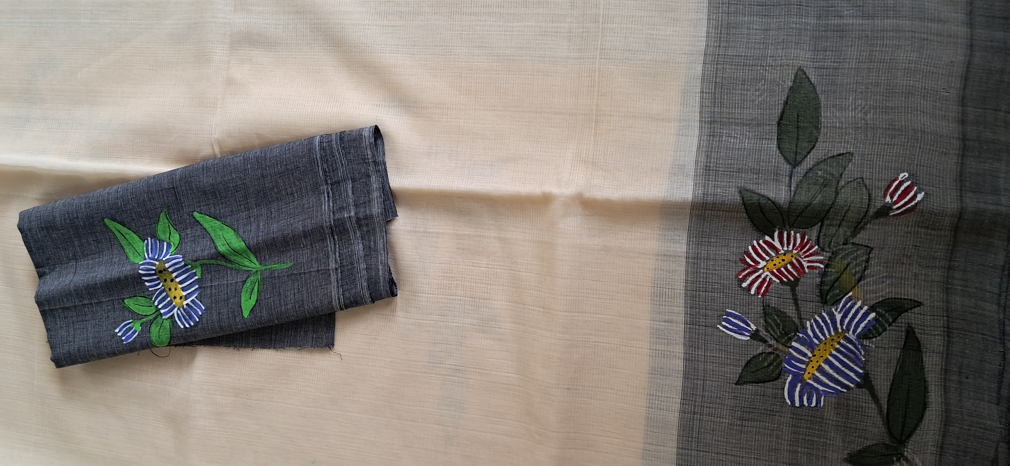 we have painted bunches in the border of the Saree. For Blouse we have painted small bunches on hands.