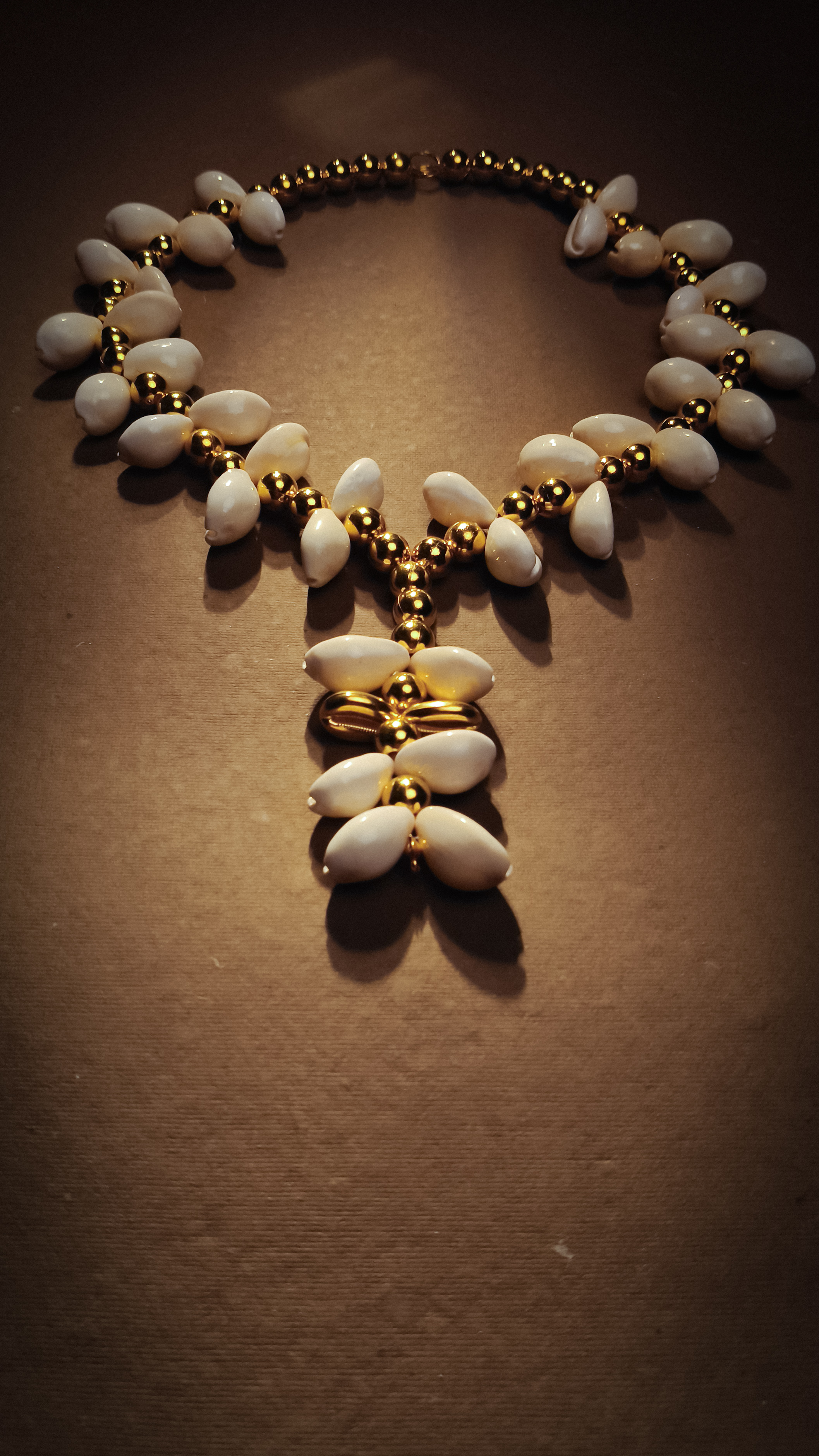 Elegant Gold and White Beaded Necklace