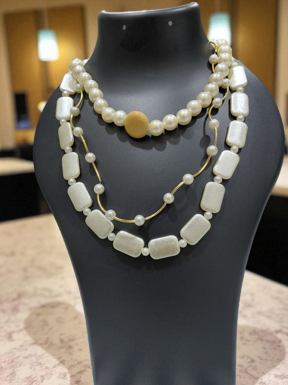 Elegant pearl and bead layered necklace