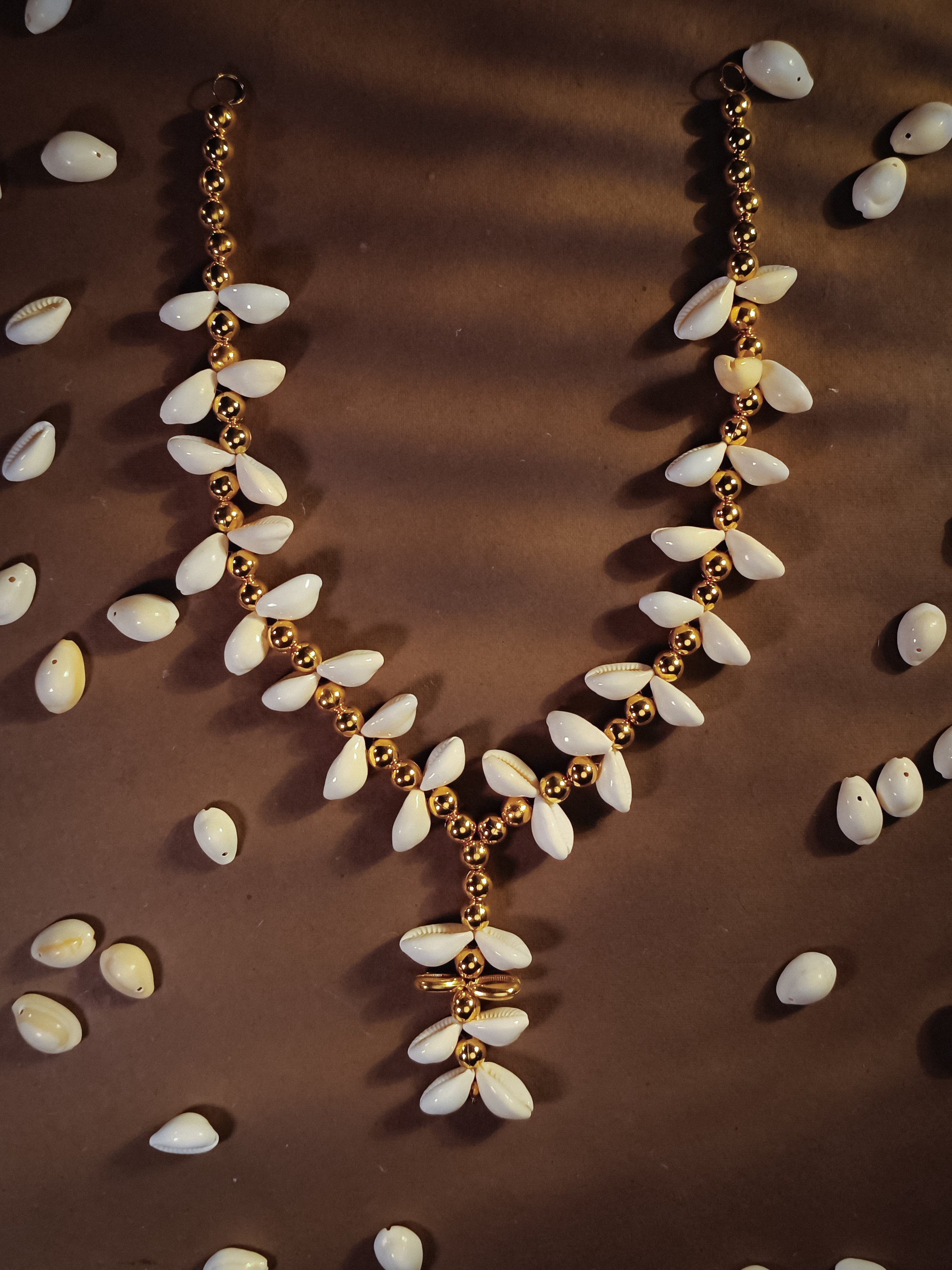 Elegant Gold and White Beaded Necklace