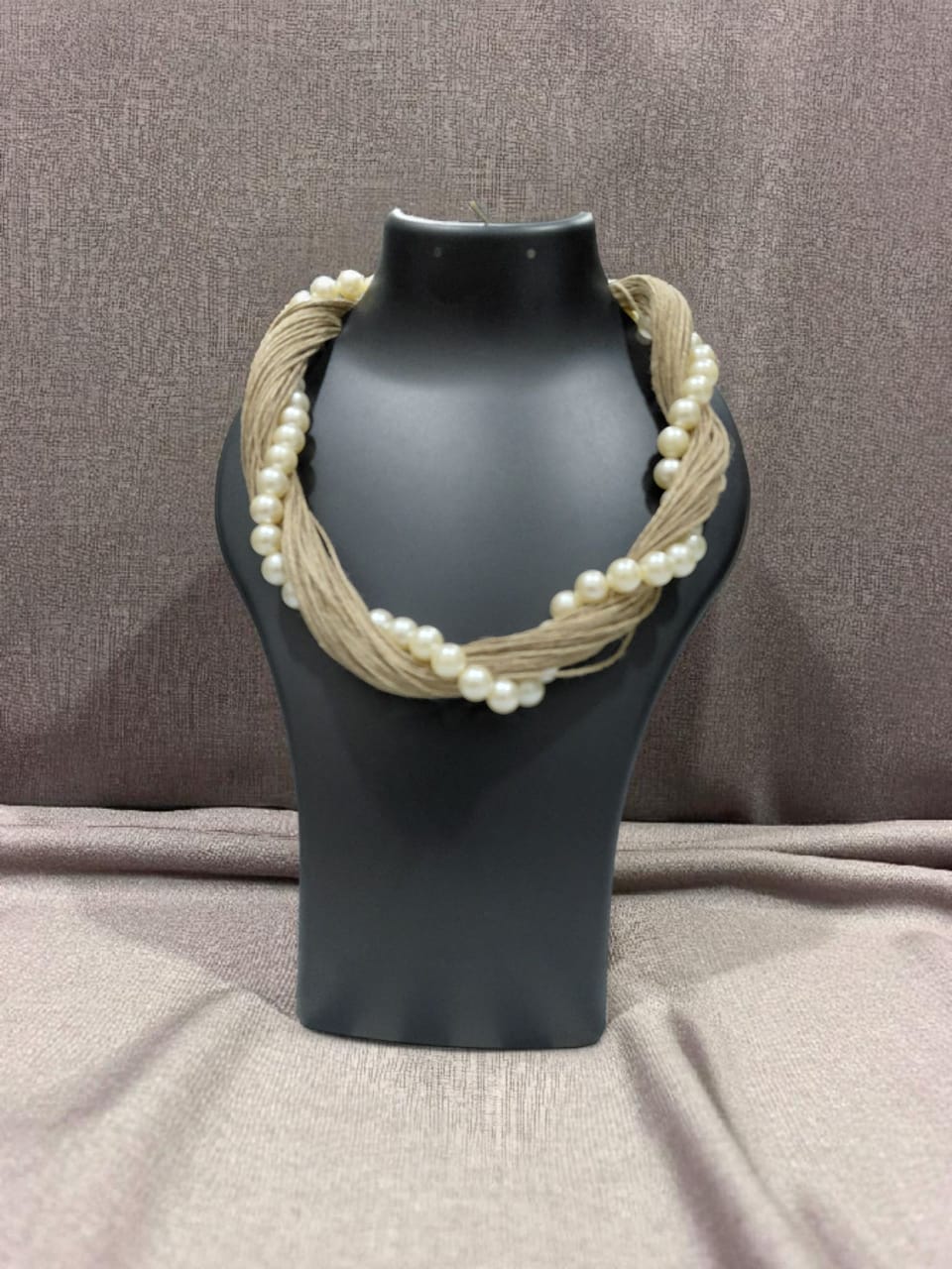 Elegant Pearl and Twine Necklace