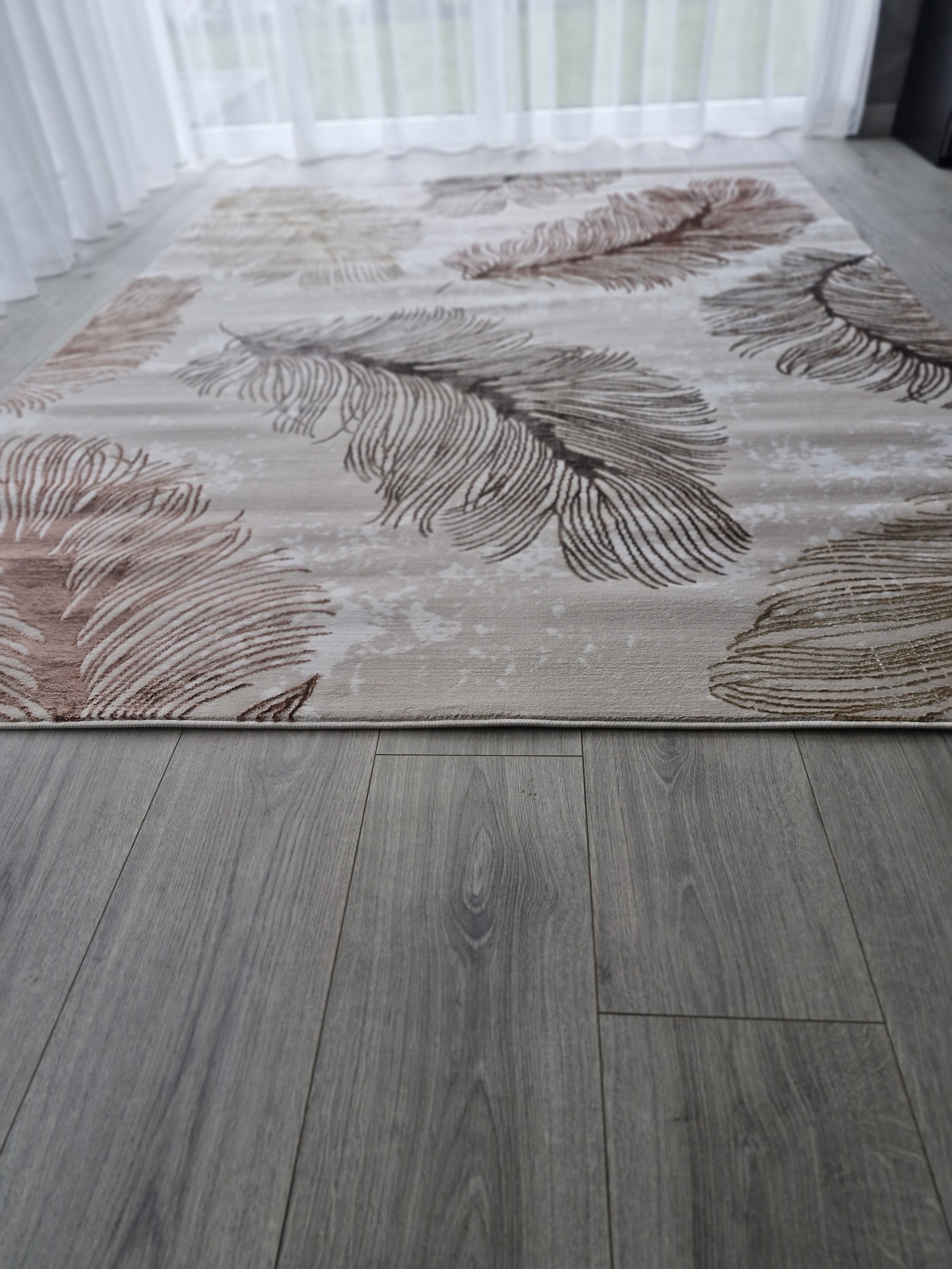 Kilimas "Pastelinės plunksnos"