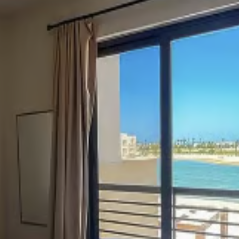 Beachfront Apartment with Balcony