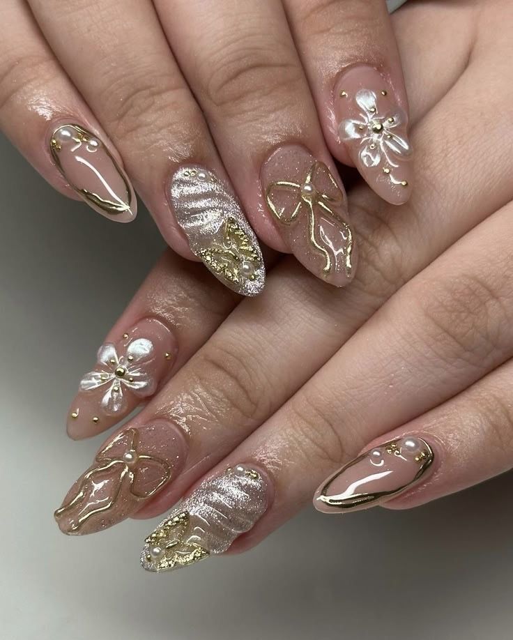 Elegant 3D Gold and Pearl Nail Art