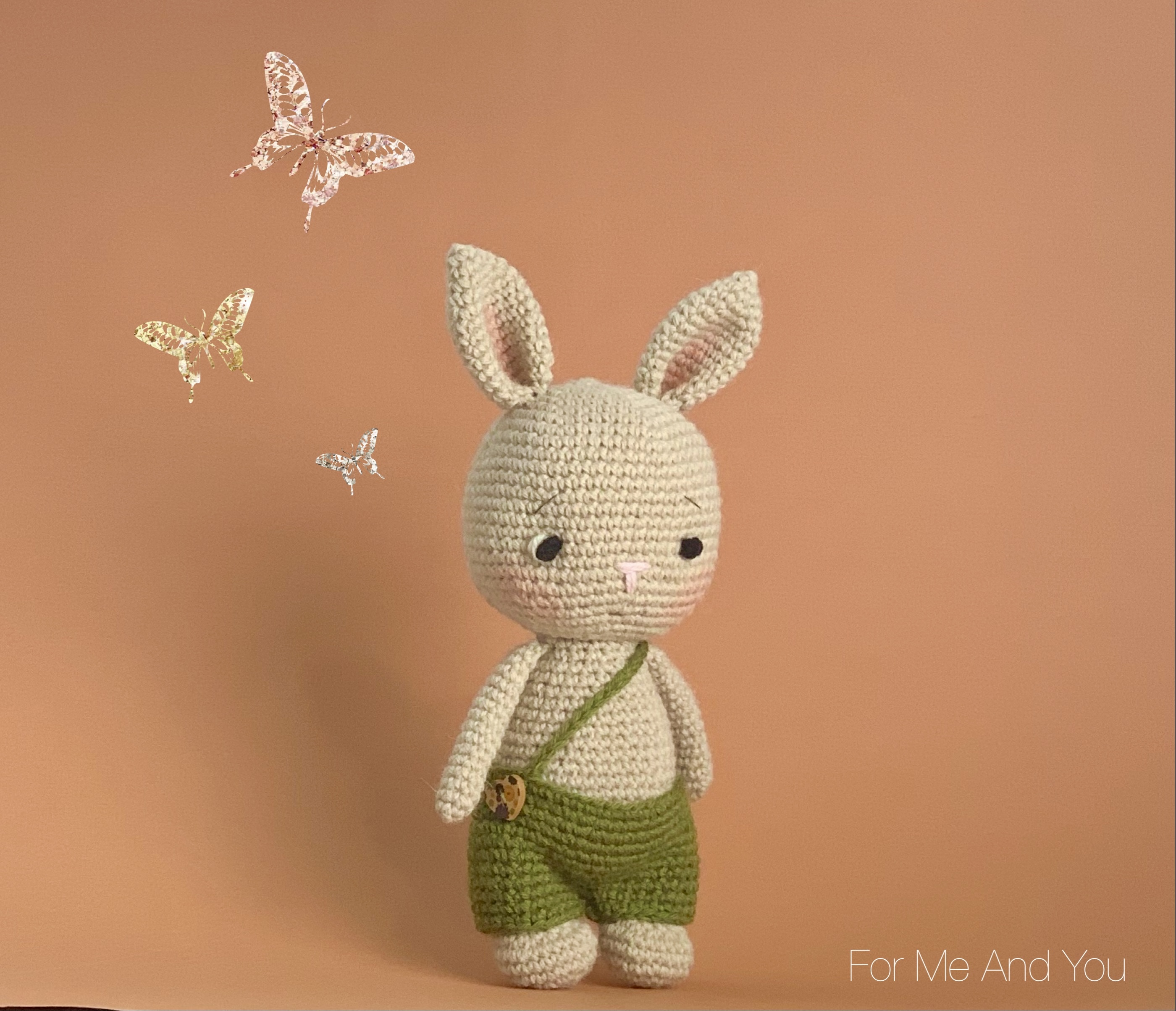 Handmade Crochet Bunny Doll wearing green overalls in 100% Alpaca Wool