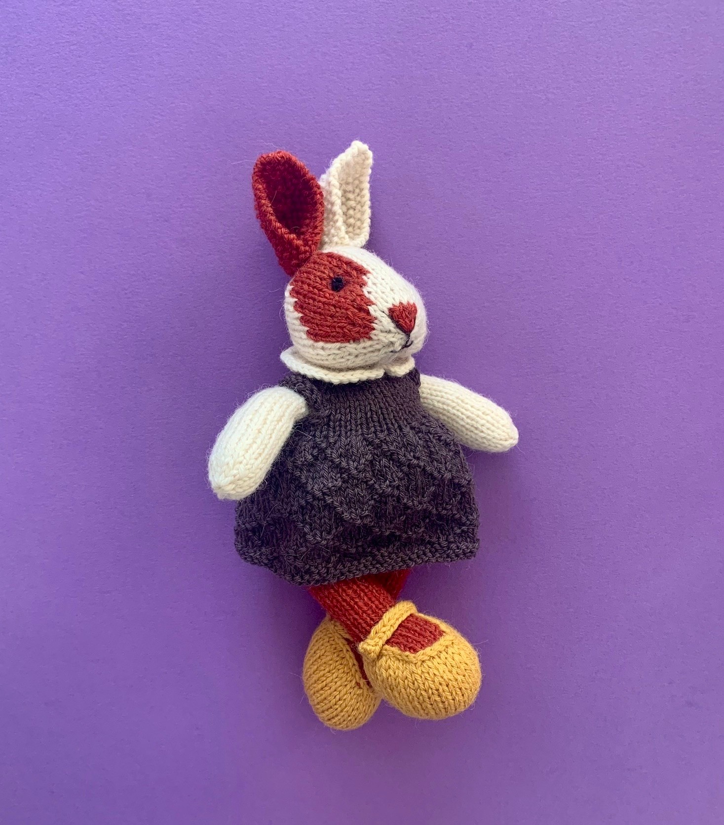 Handmade Knitted Bunny Doll with a purple dress in 100% Alpaca Wool