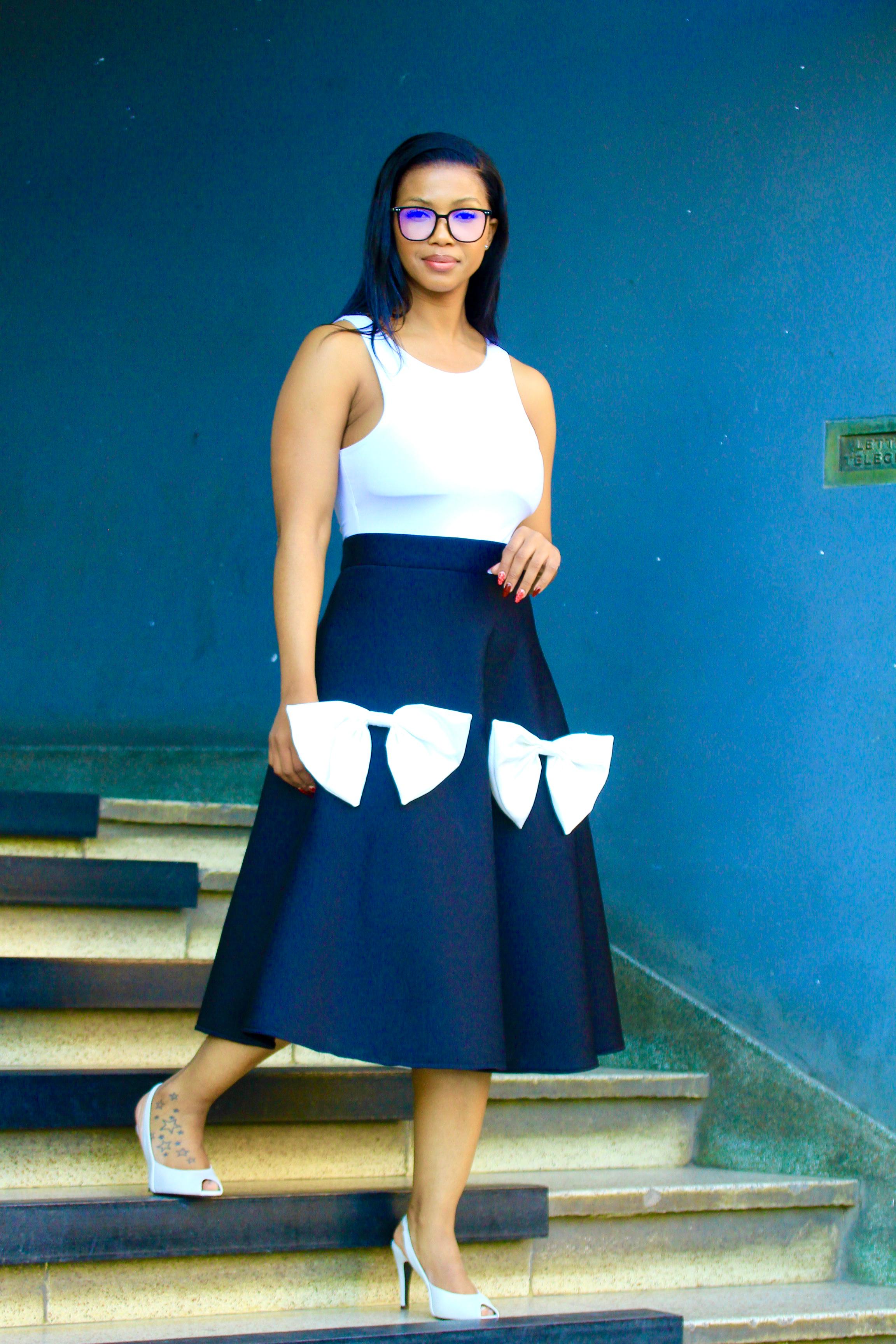 Black skirt with white bows