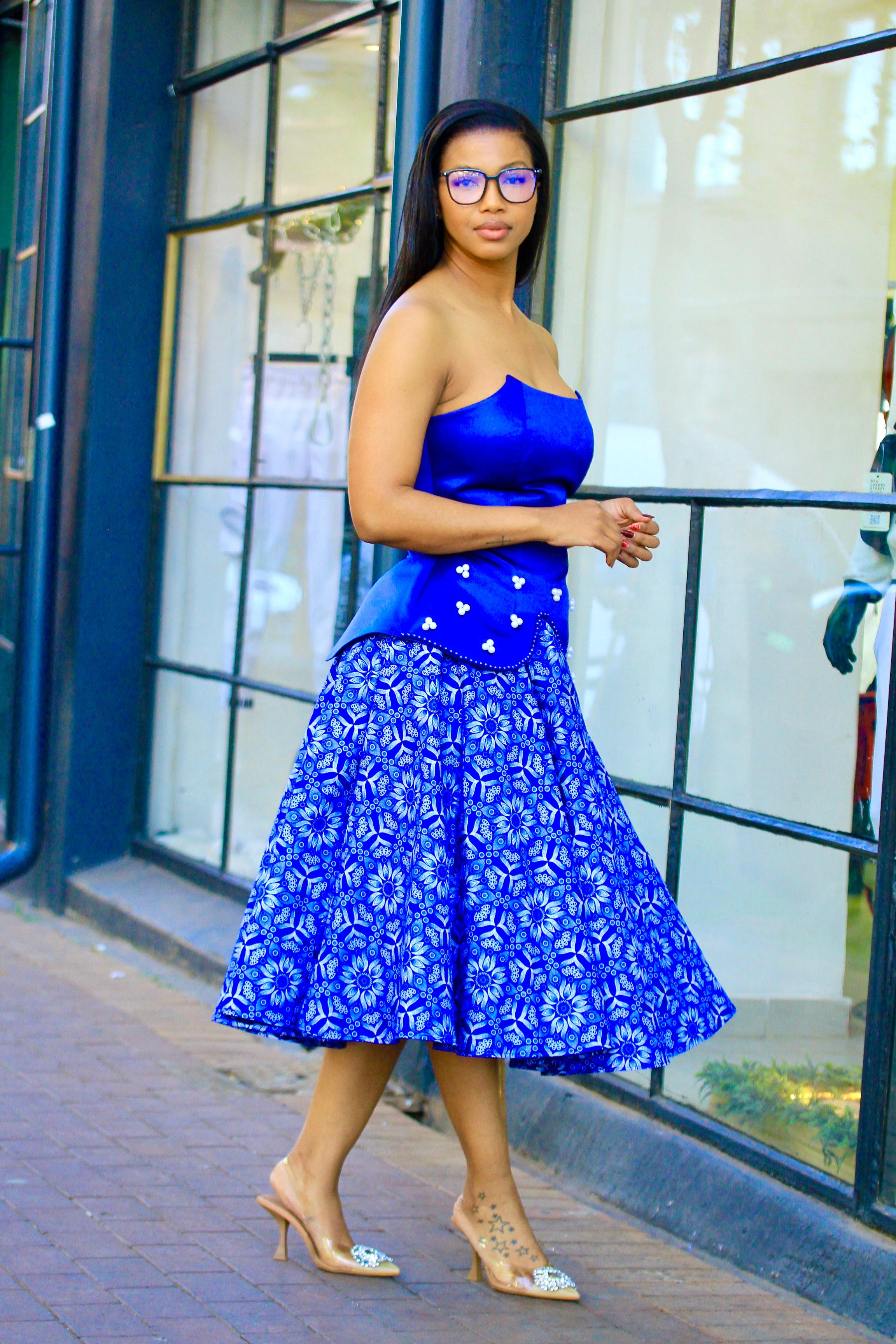 Royal blue two piece with blue and white beads