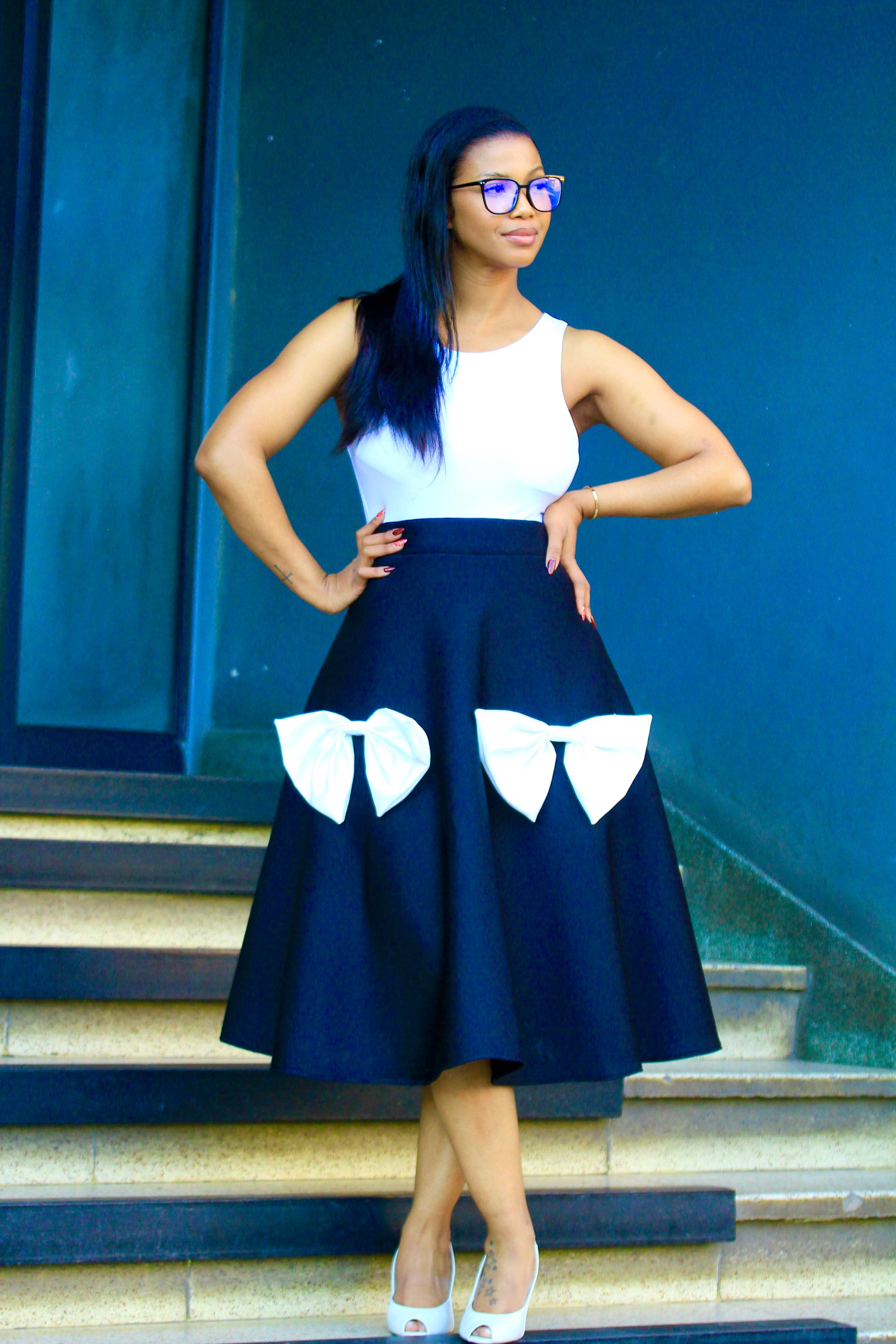 Black skirt with white bows