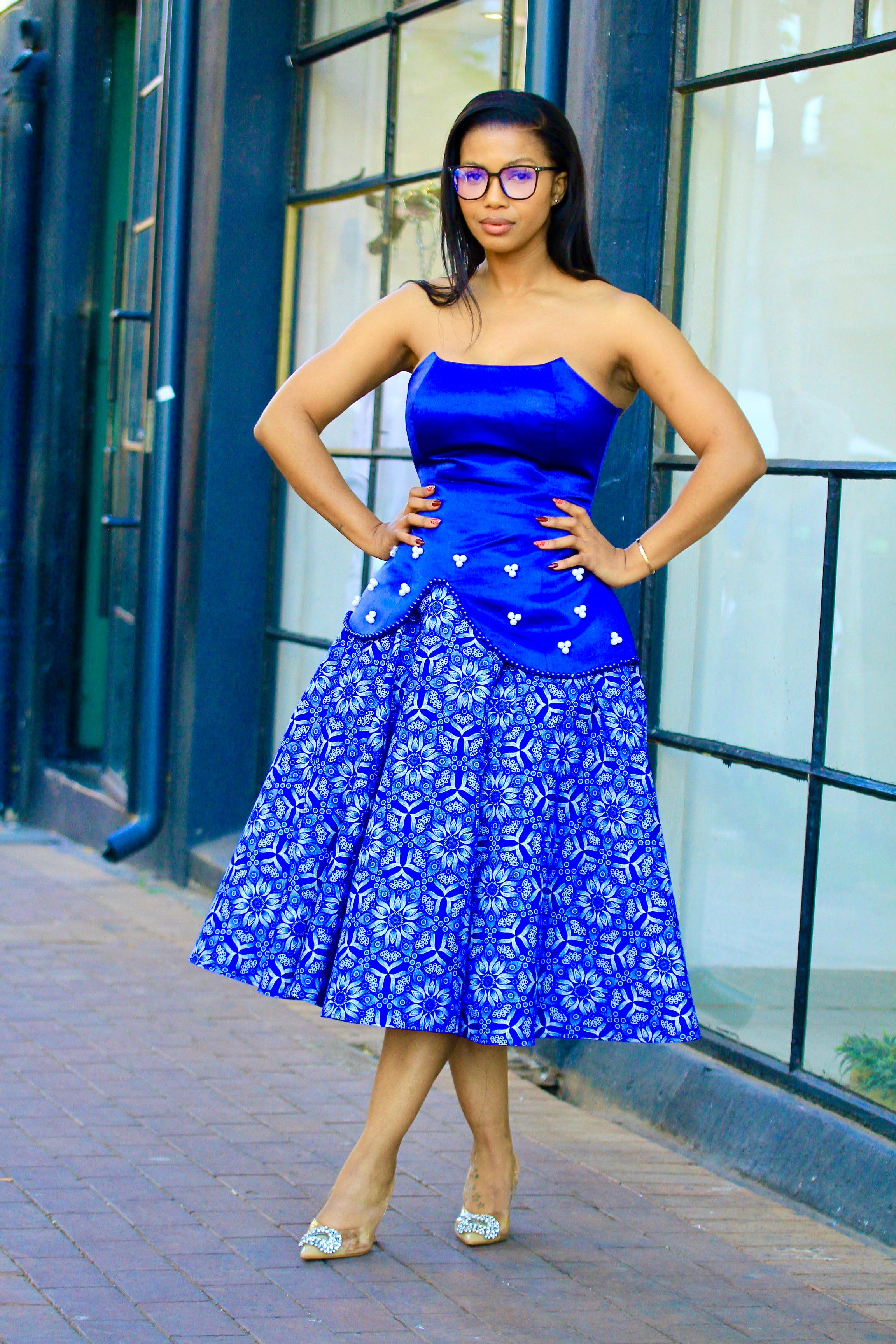 Royal blue two piece with blue and white beads