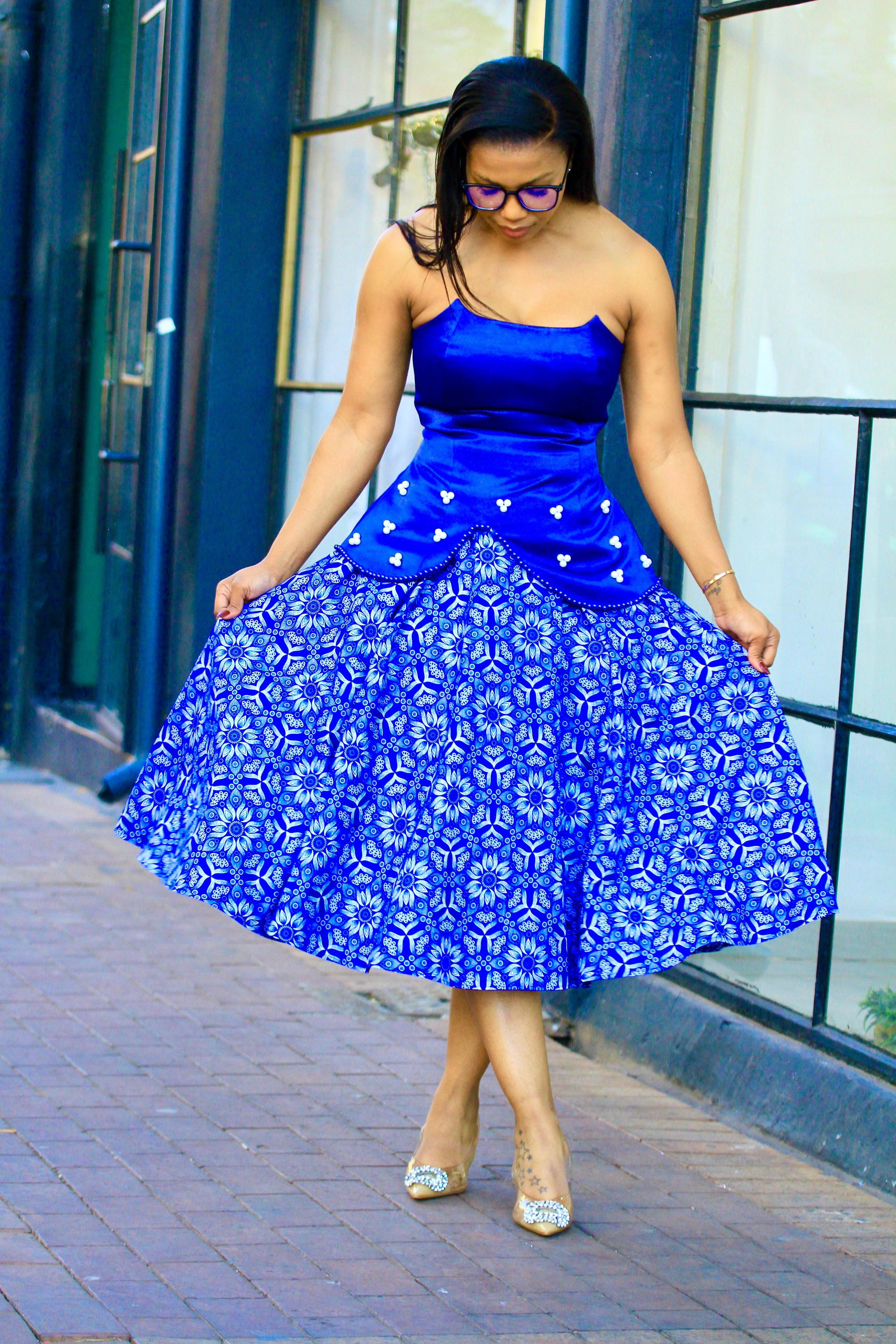 Royal blue two piece with blue and white beads