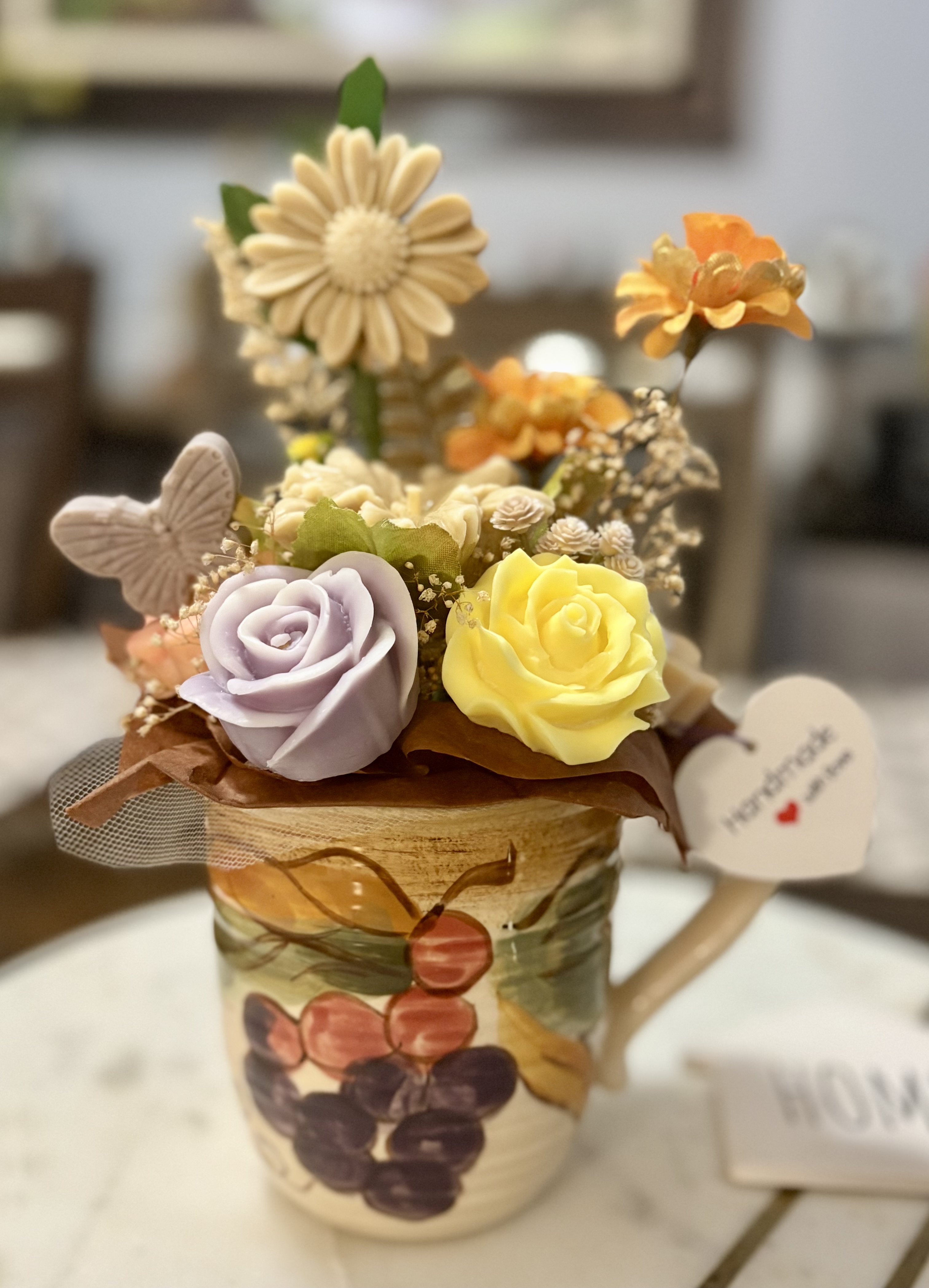 Decorative flower mug arrangement