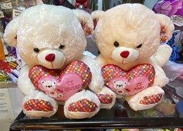 Osos de peluche con corazón 50 cms
