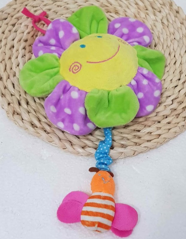 Juguete de peluche bebé Flor musical a cuerda