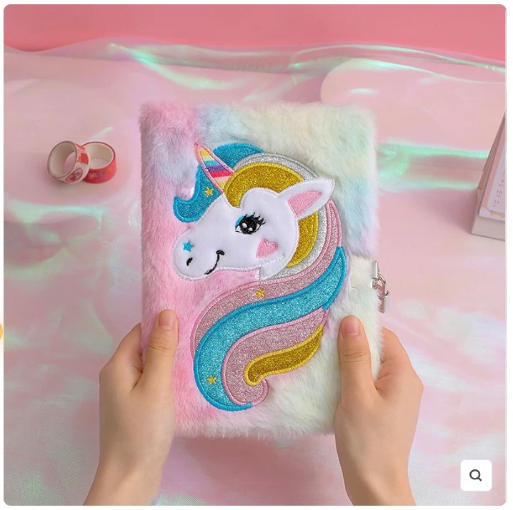 Cuaderno de unicornio peluche