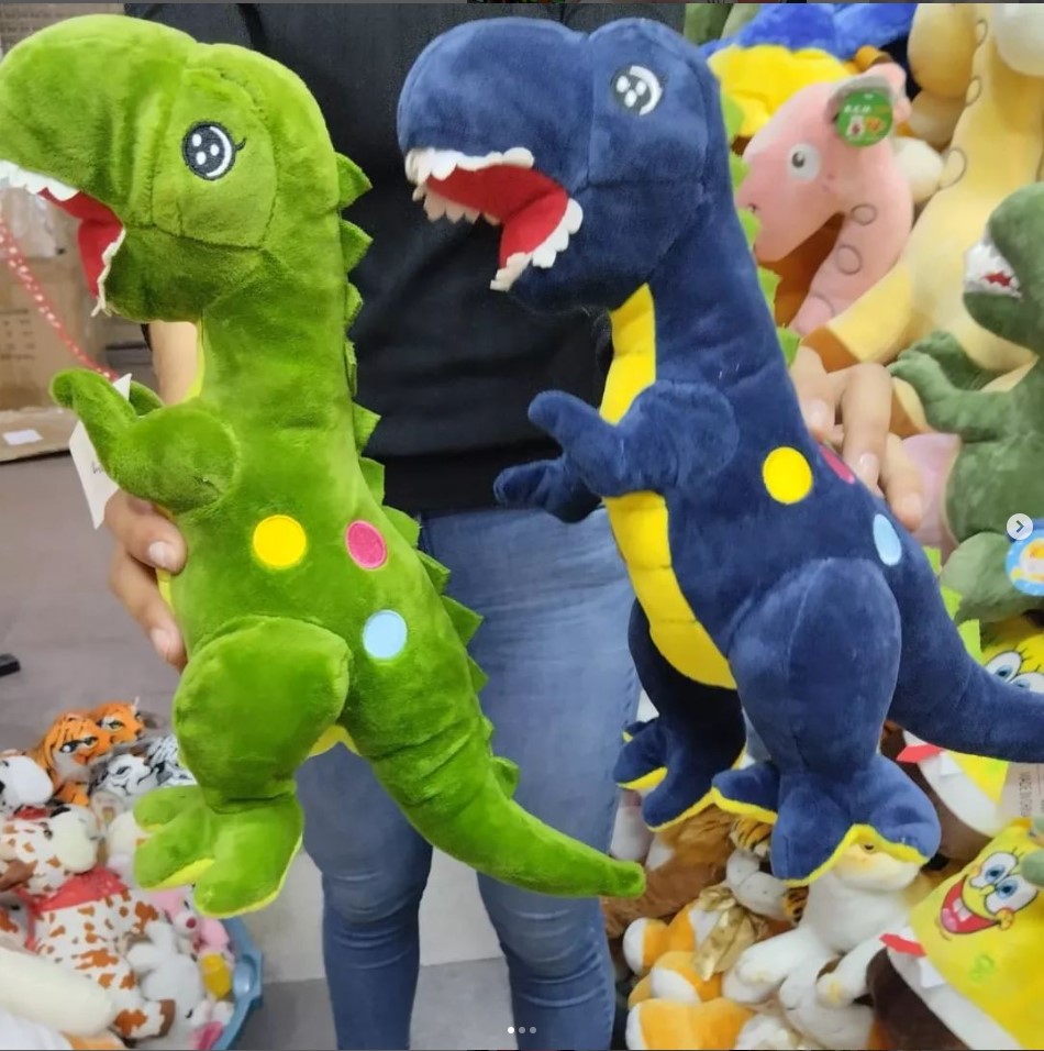 Peluche gigante de dinosaurio 60 cms musical