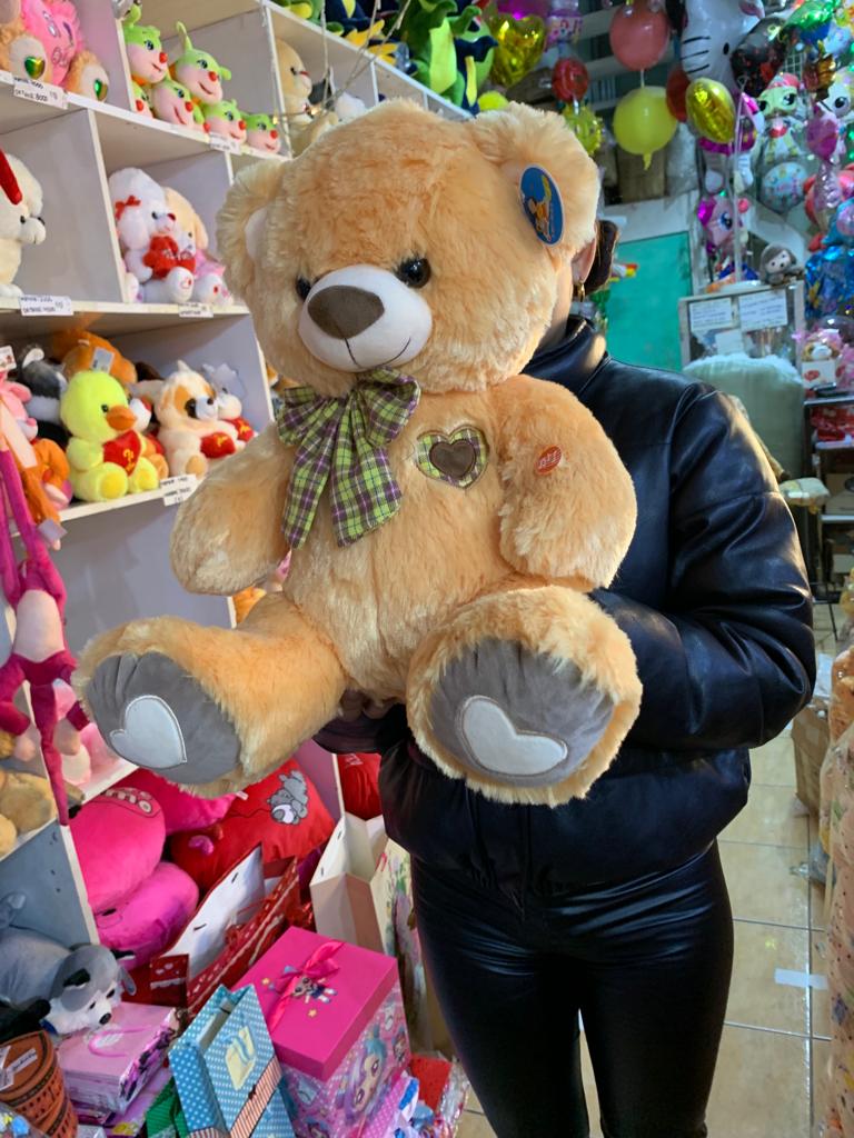 Osos de peluche en tono cafe de 40 cms musical