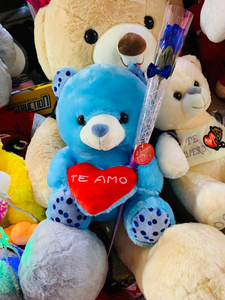 Osos de peluche azul con corazón musical