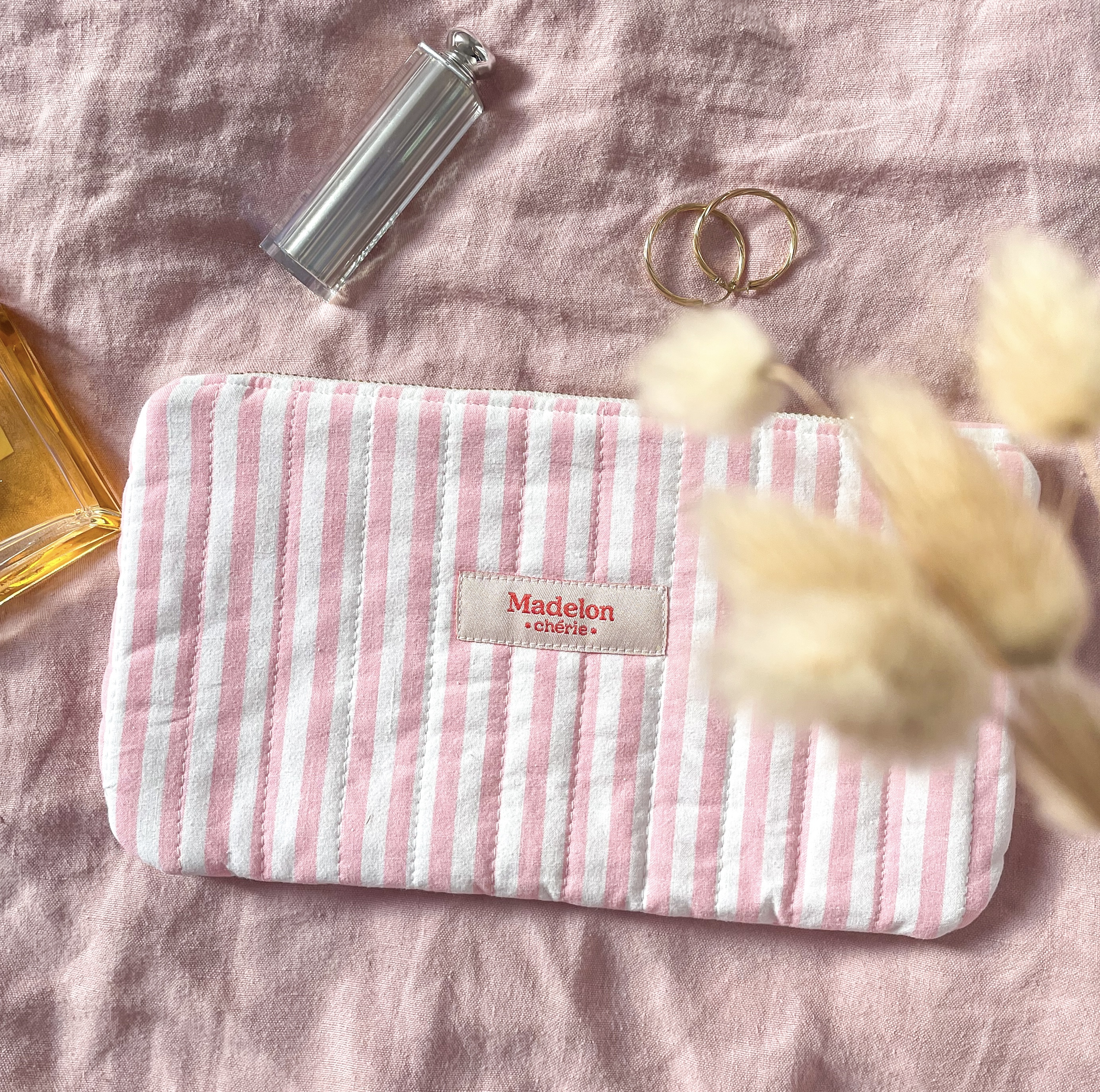 Pochette rayée rose 