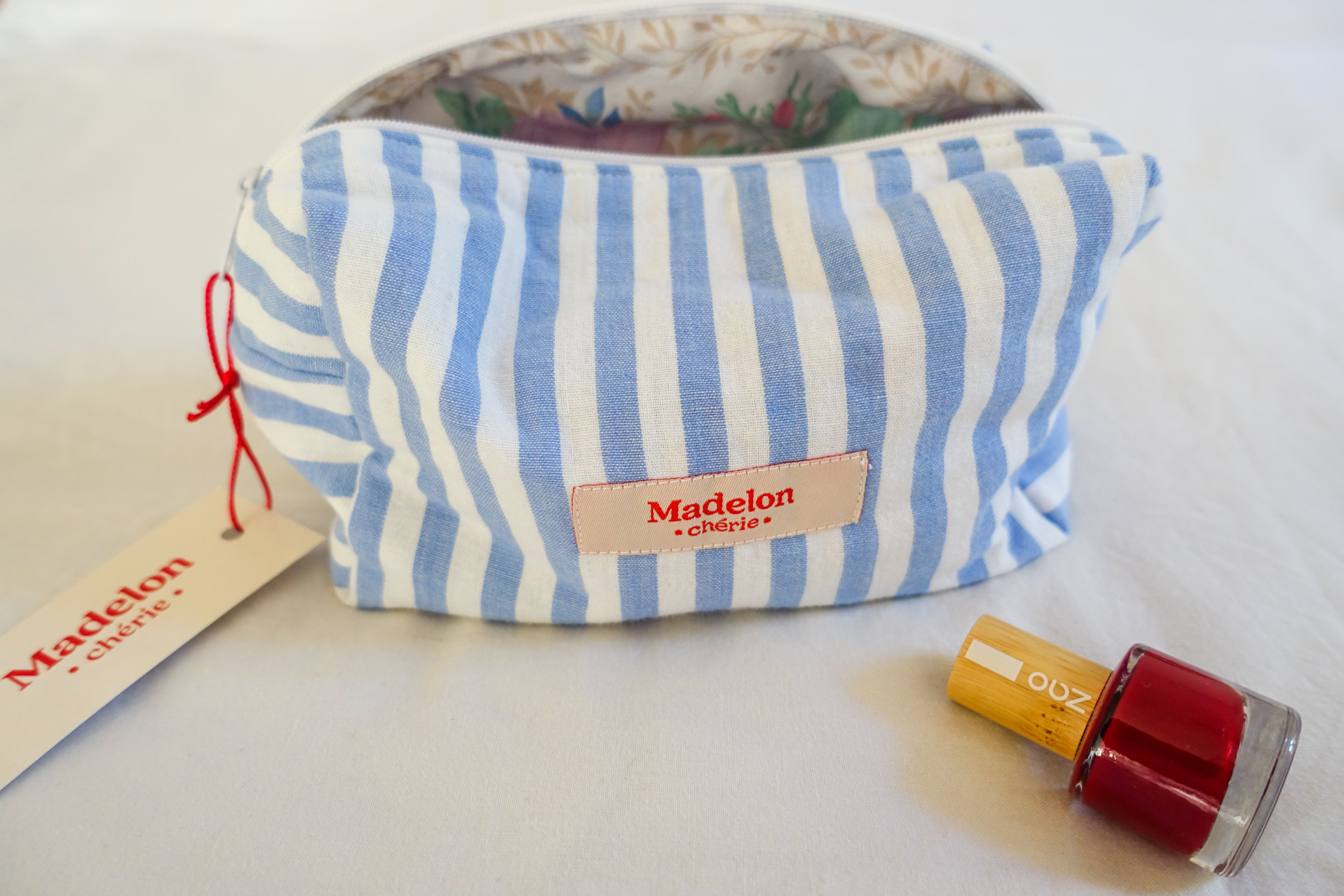 Petite trousse de toilette rayée bleue