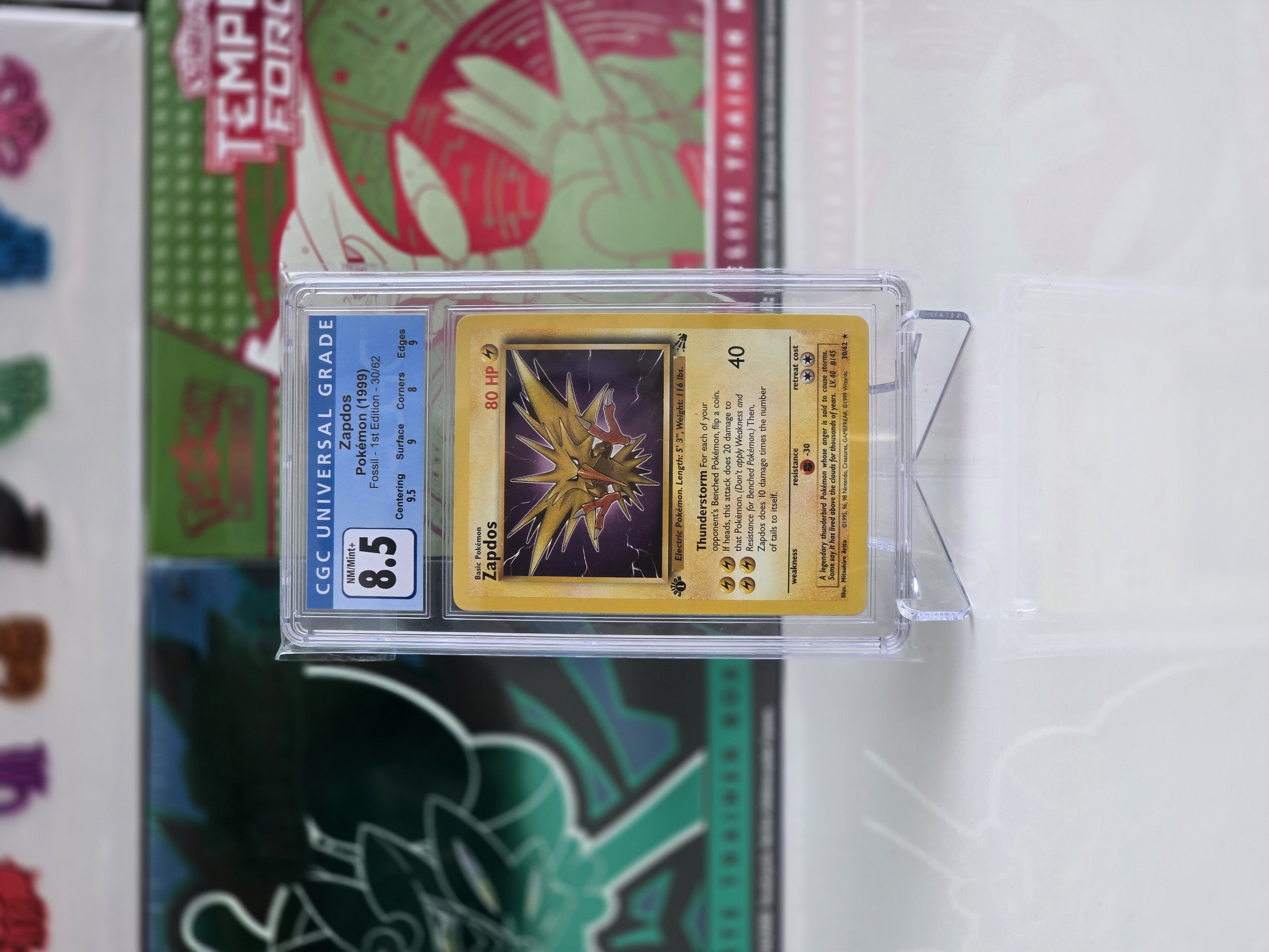 CGC 8.5 Zapdos Fossil 1st Edition 1999