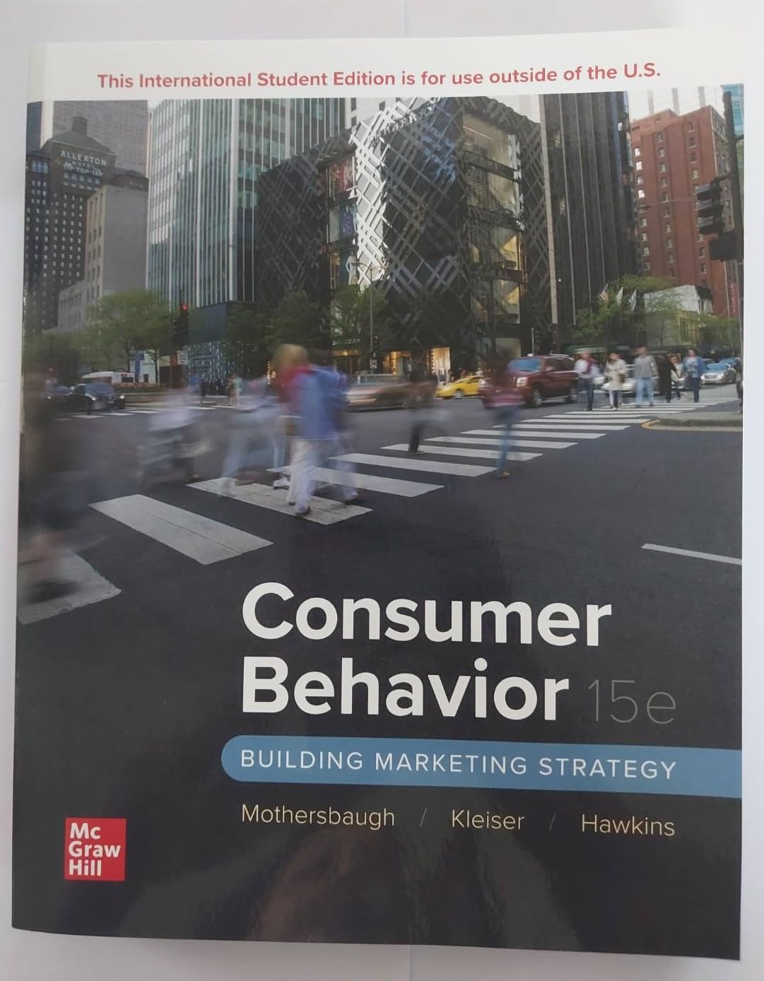Consumer Behavior: Building Marketing Strategy ISE Paperback – January 1, 2023