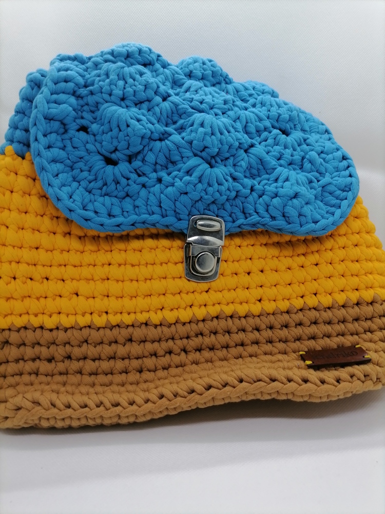 Sac à dos bleu, orange, marron