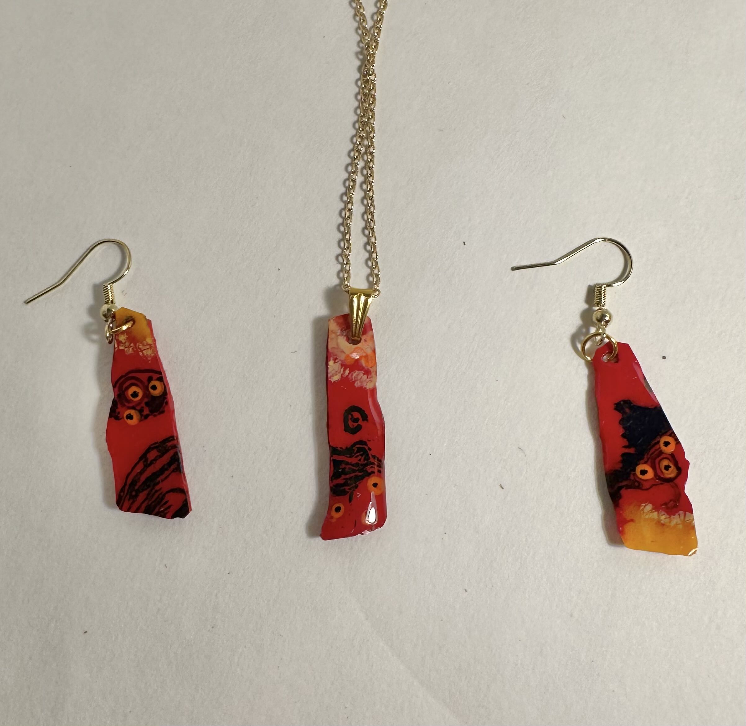 Handmade Red Pendant Jewelry Set made with acrylic and resin pouring.