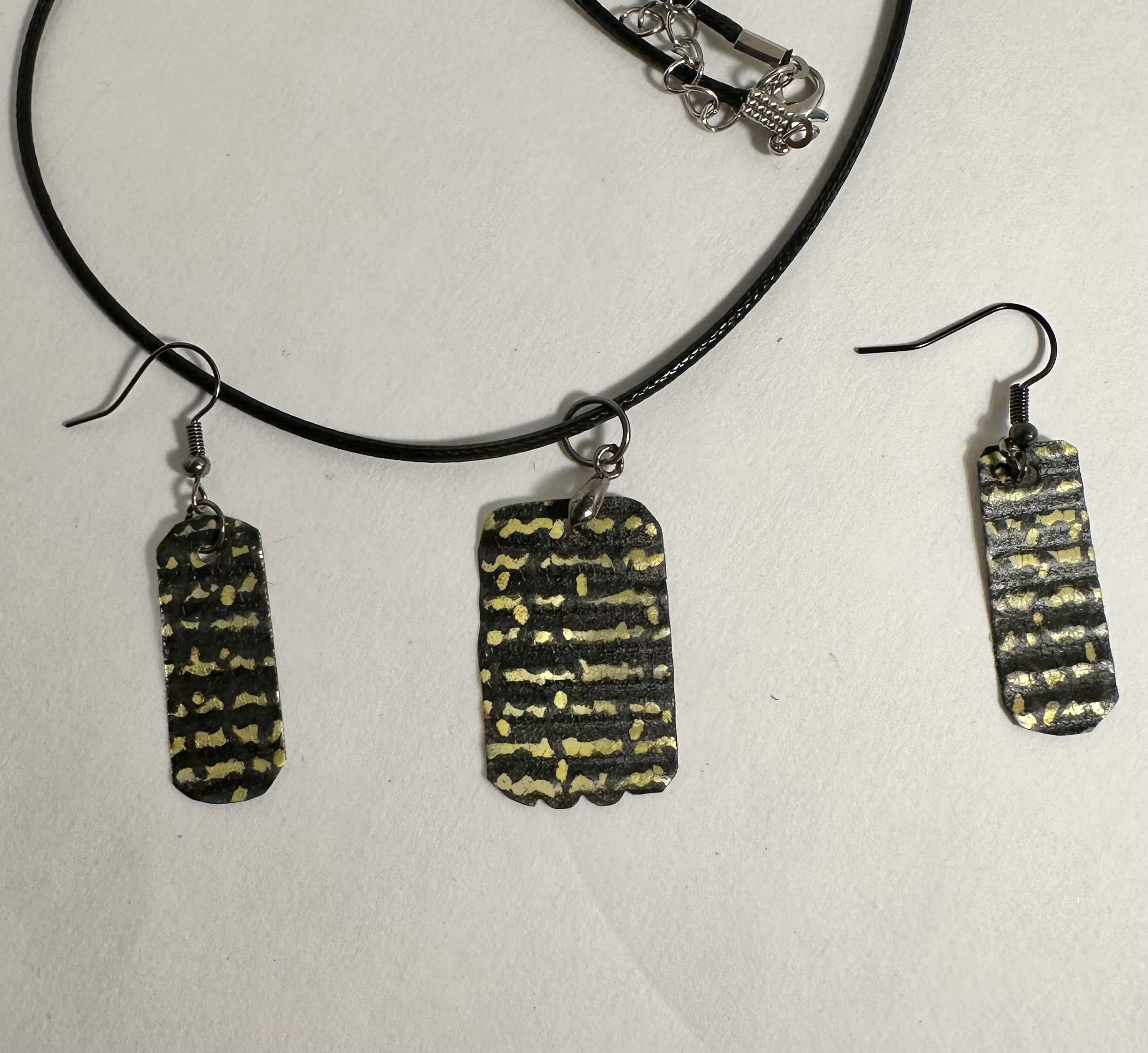 Handmade Black and Gold Jewelry Set made with recycling metal, spray and acrylic paint and gloss sealer.