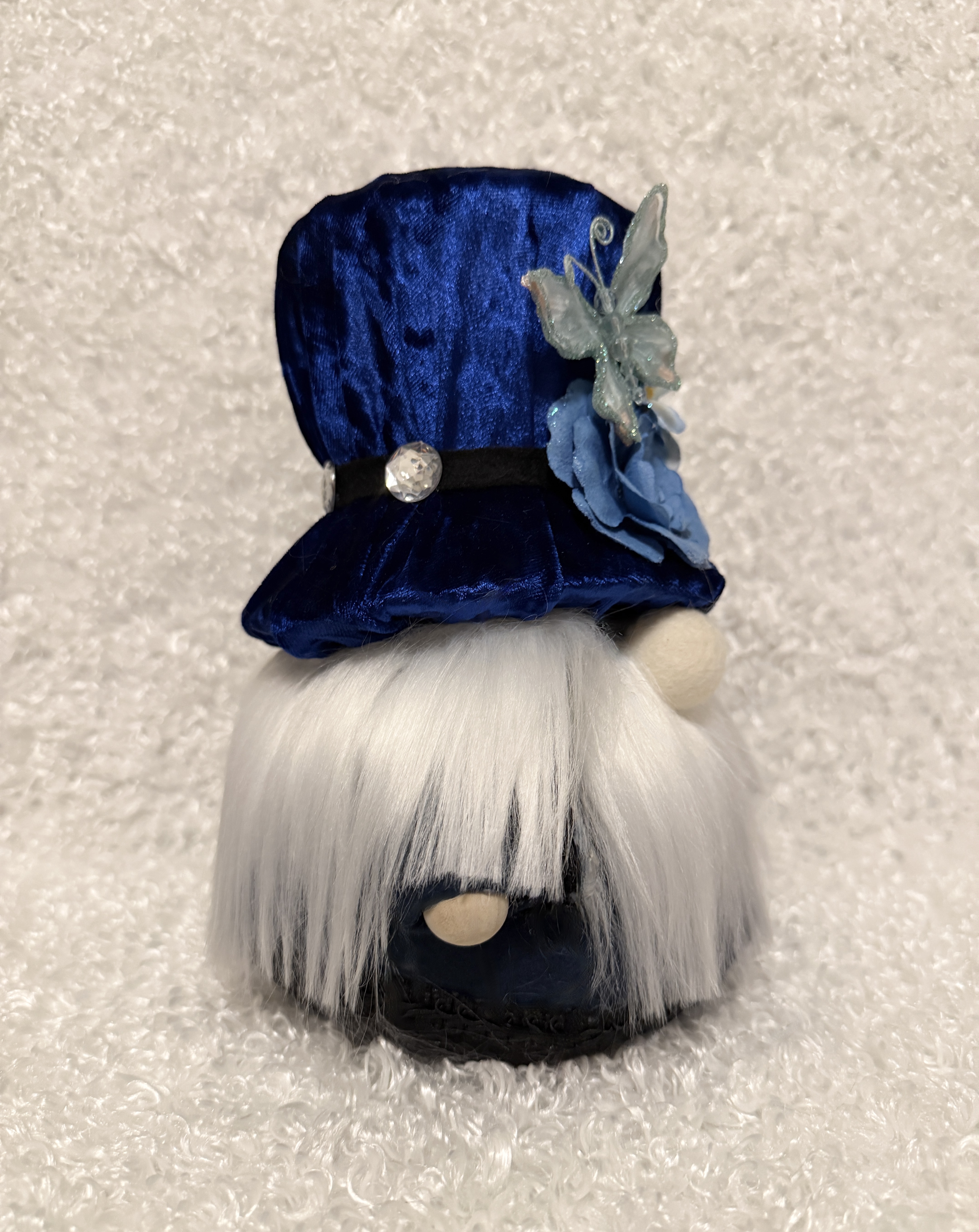 Charming Gnome with Blue Velvet Hat and Butterfly and Floral Accents