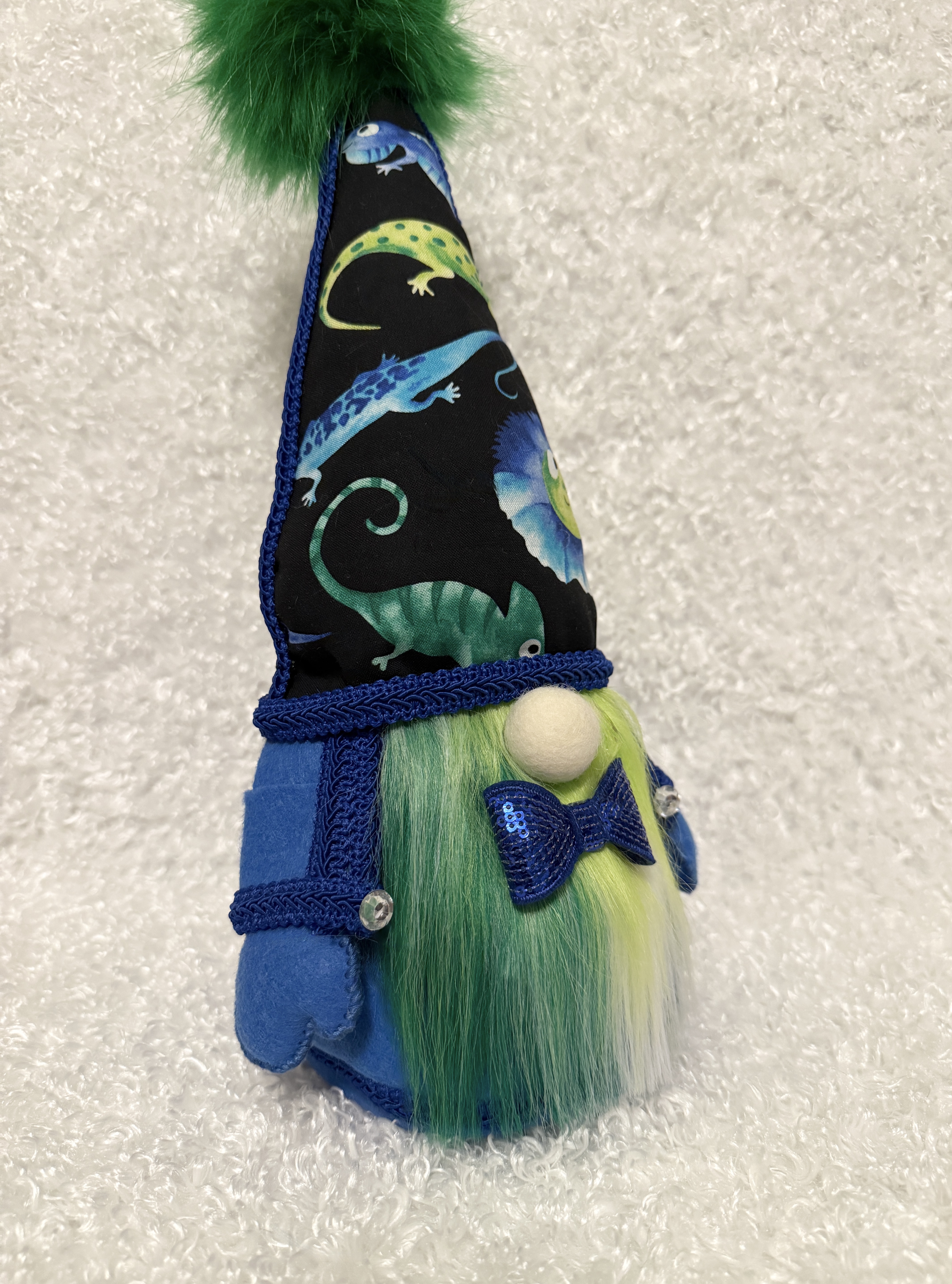 Whimsical Gnome with Lizard-Themed Hat and Fluffy Green Shaded Beard