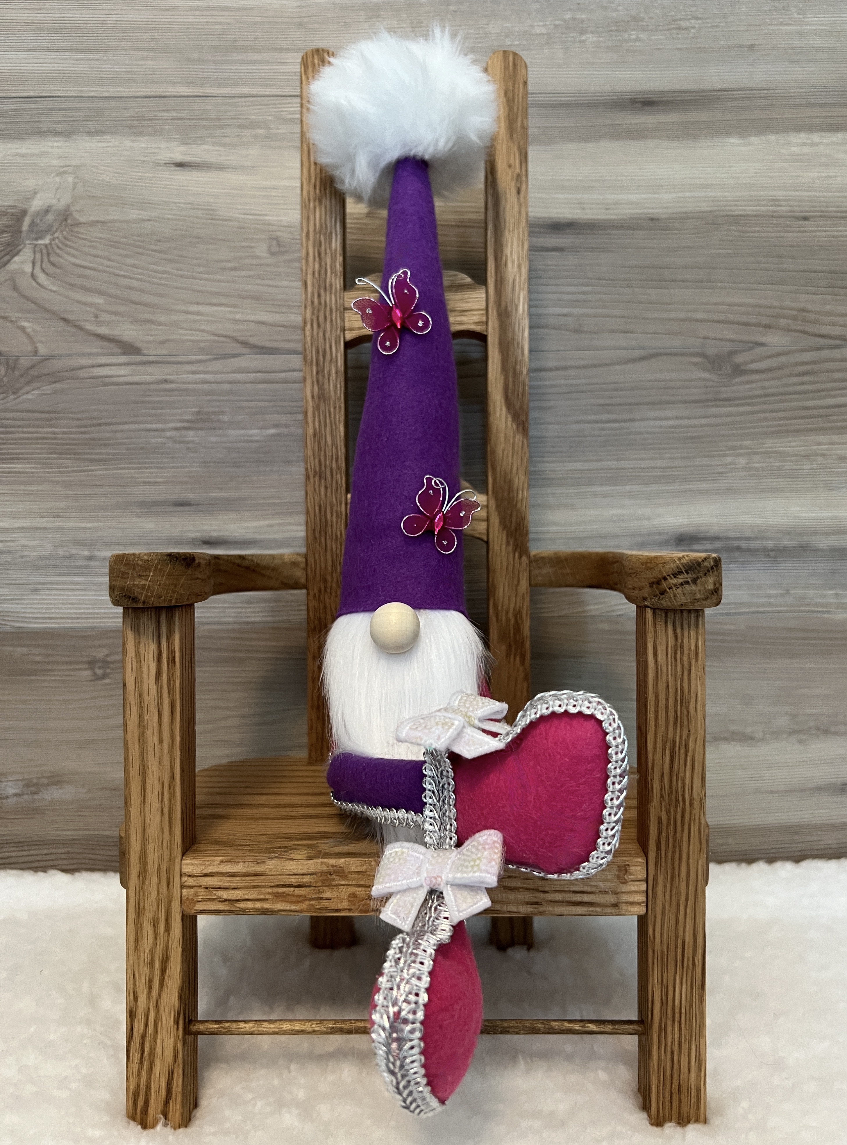 Sitting Pink and Purple Gnome with Butterfly Accents on Hat